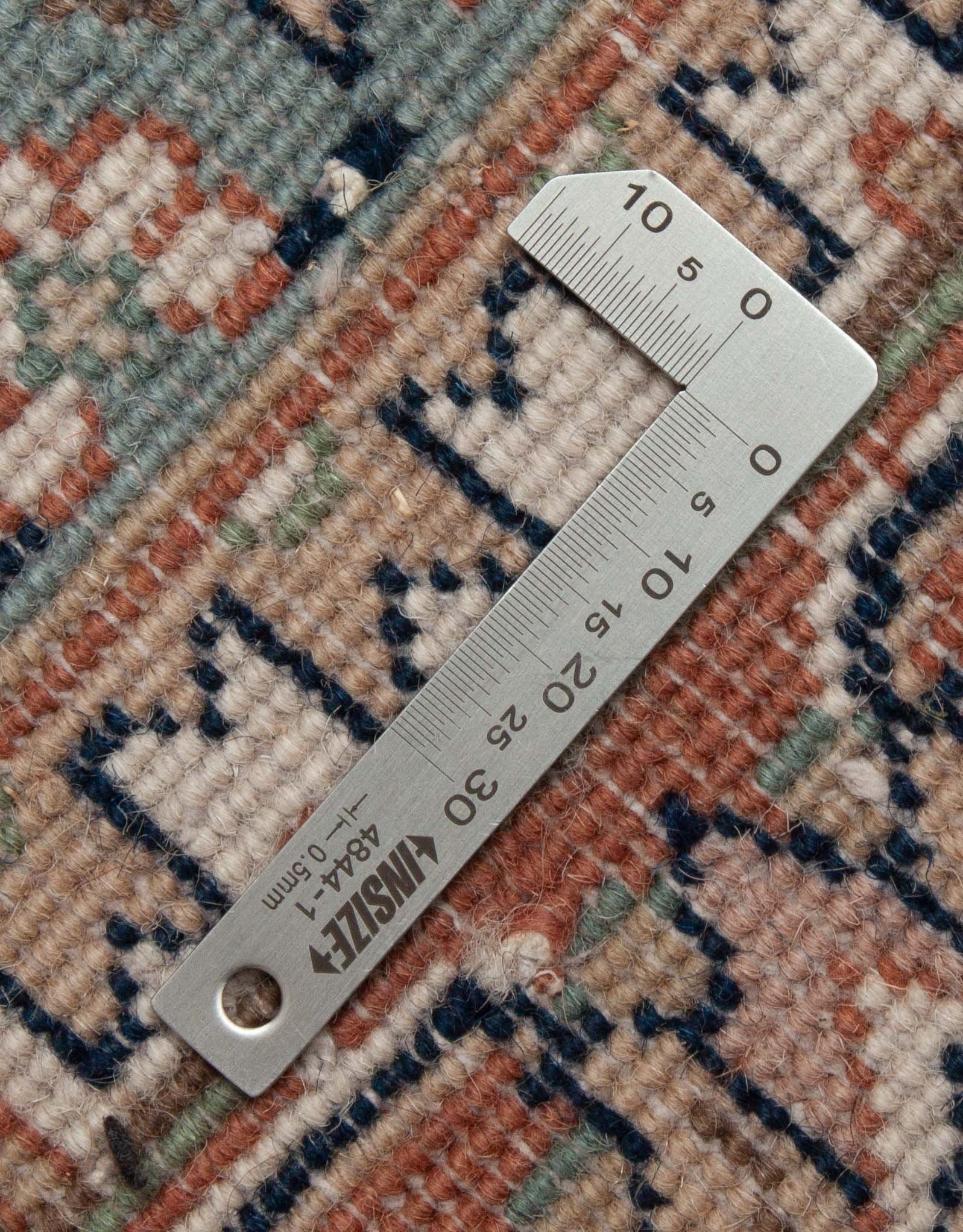 Eine Fotoaufnahme eines Herati Teppichs.