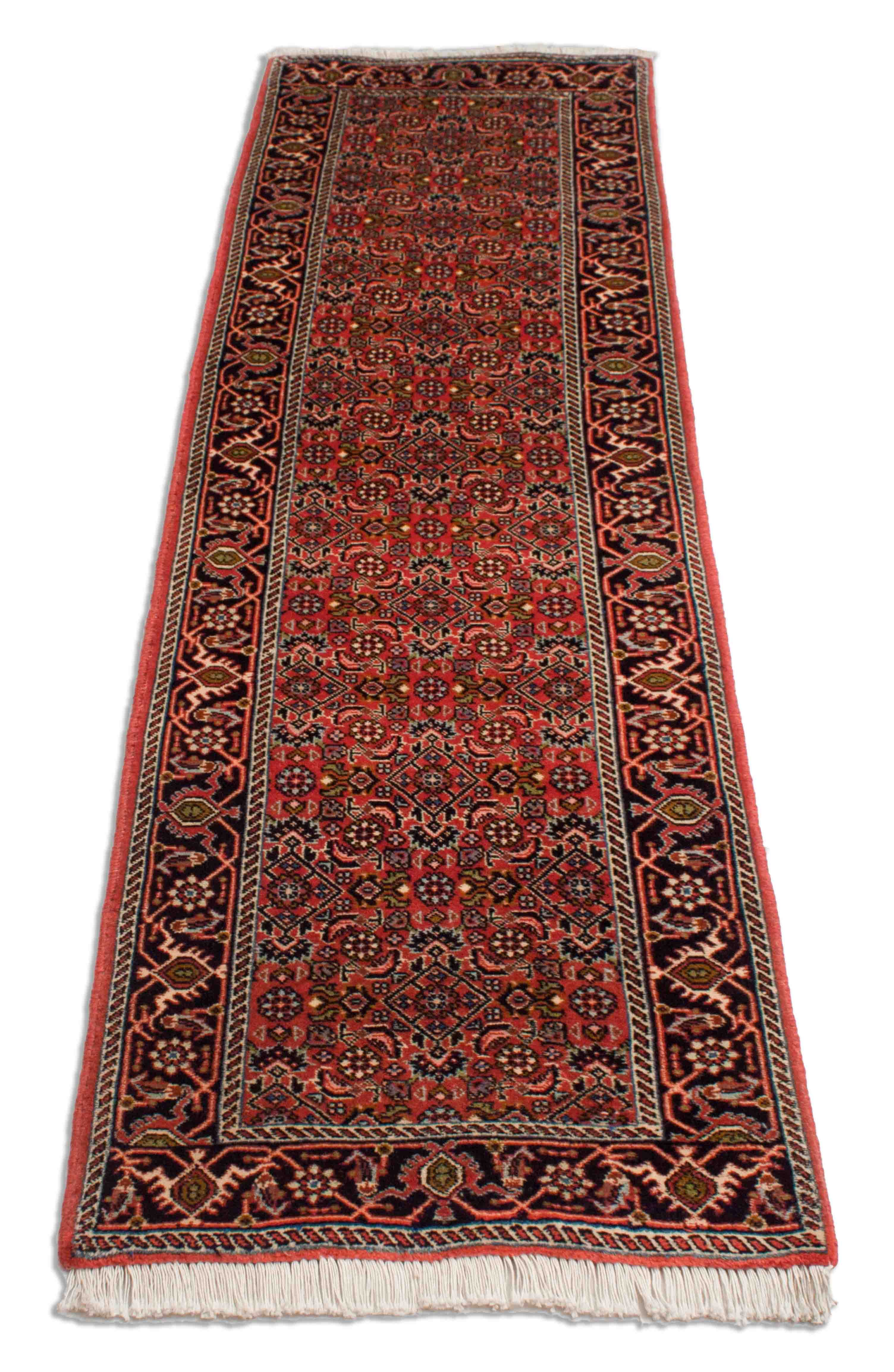 Eine Fotoaufnahme eines Bidjar Teppichs.