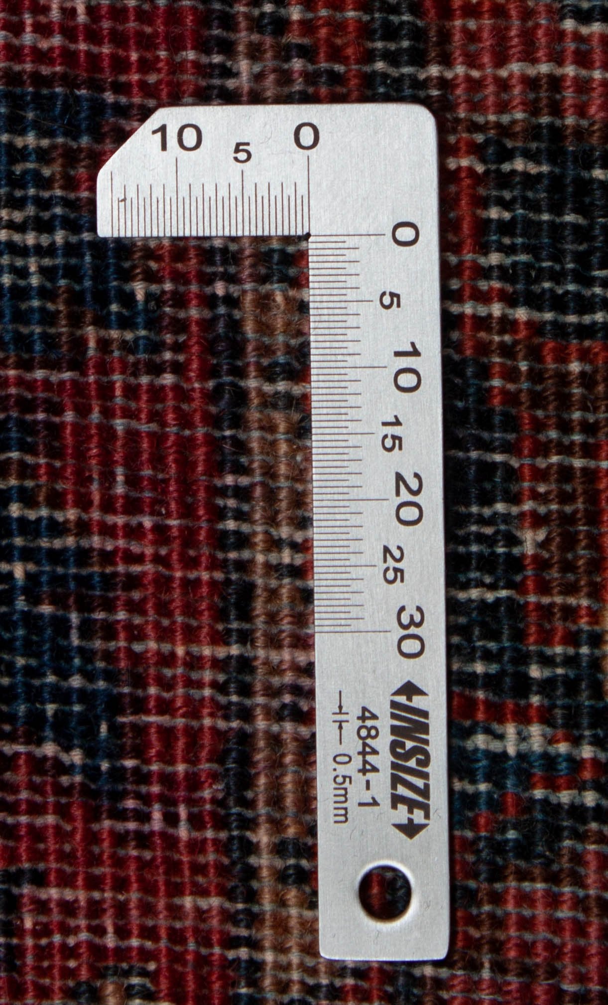 Eine Fotoaufnahme eines Re-Import Sarough Teppichs.