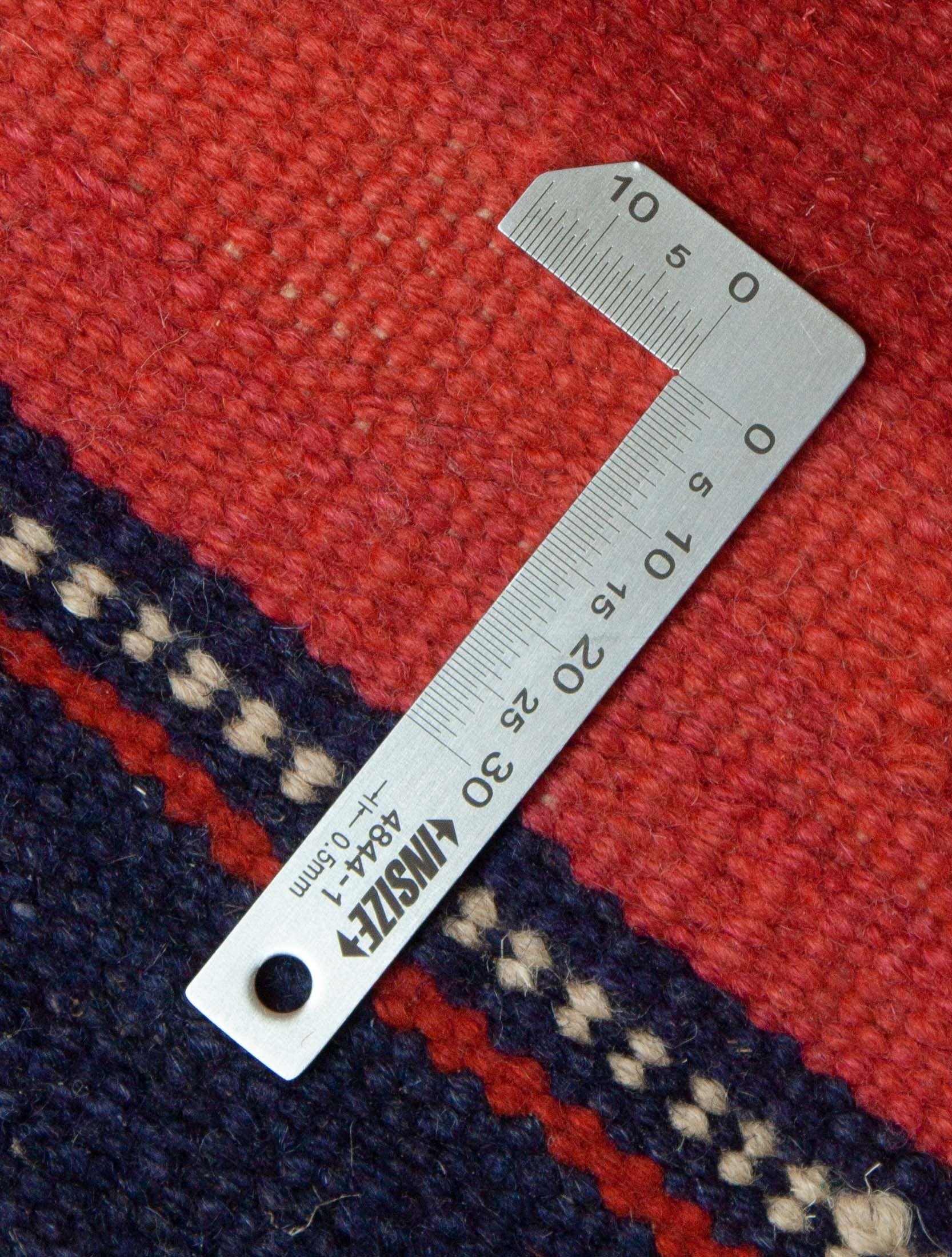 Eine Fotoaufnahme eines Kurdischer Kelim Teppichs.