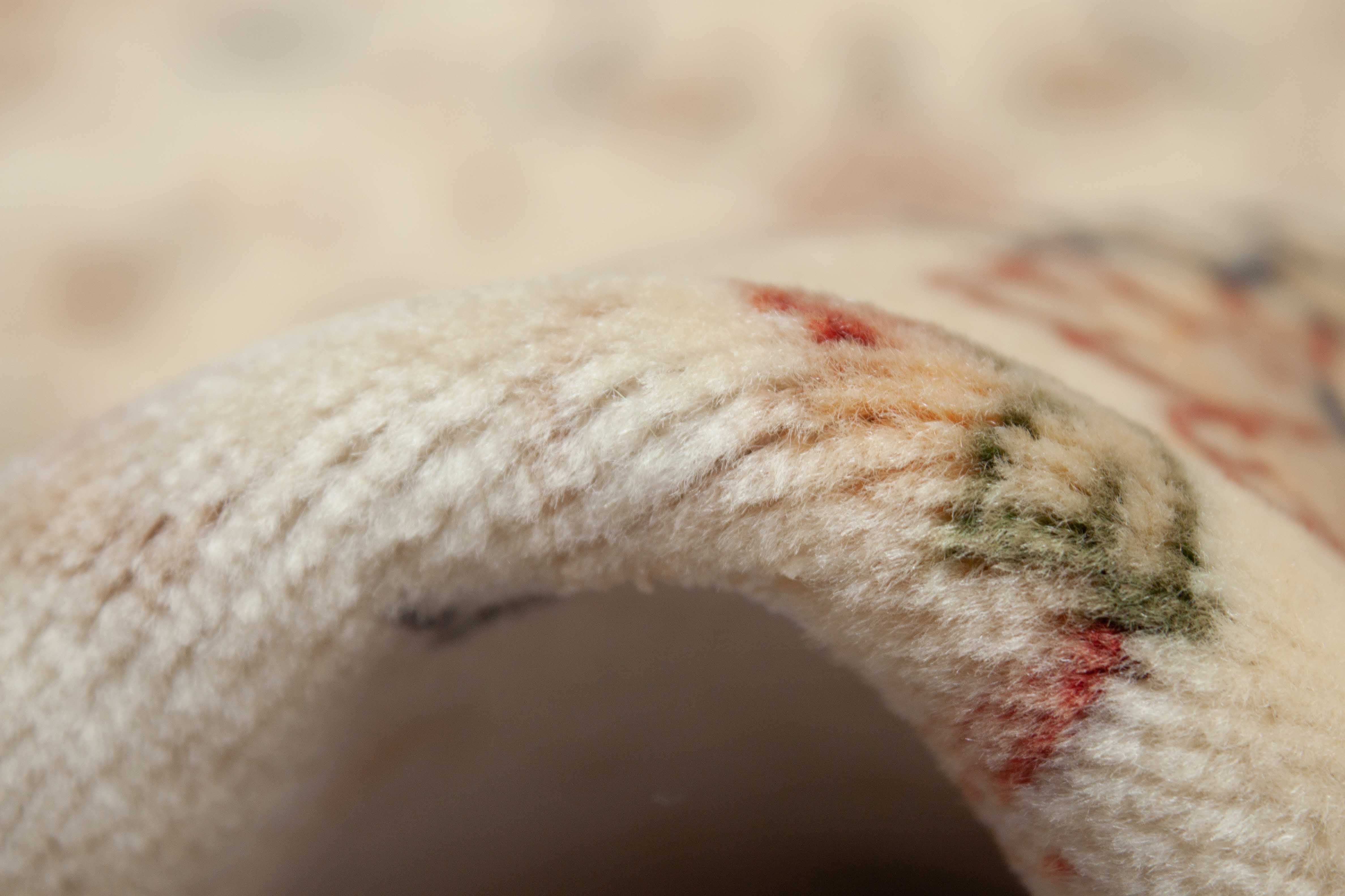 Eine Fotoaufnahme eines Täbriz Teppichs.