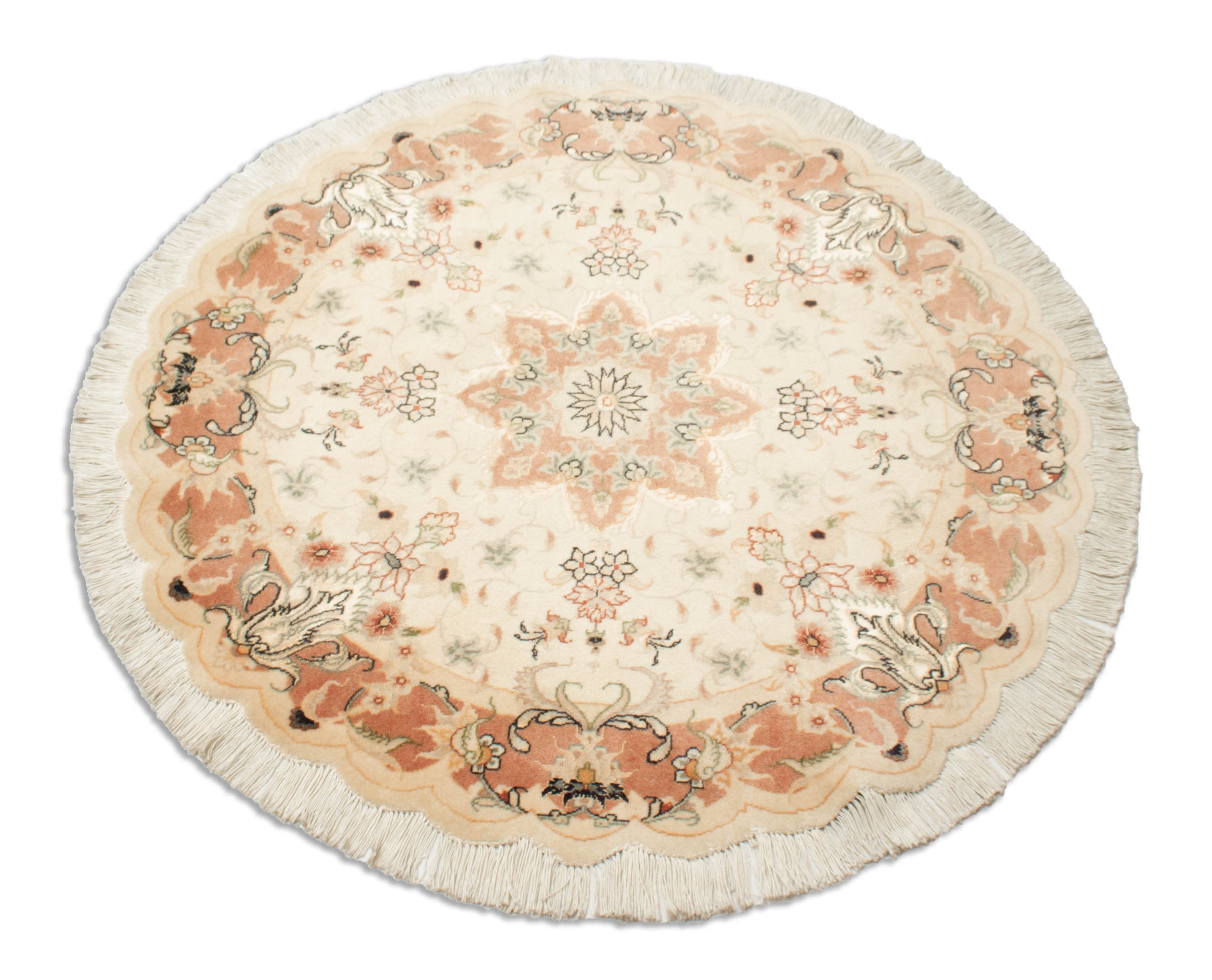 Eine Fotoaufnahme eines Täbriz Teppichs.