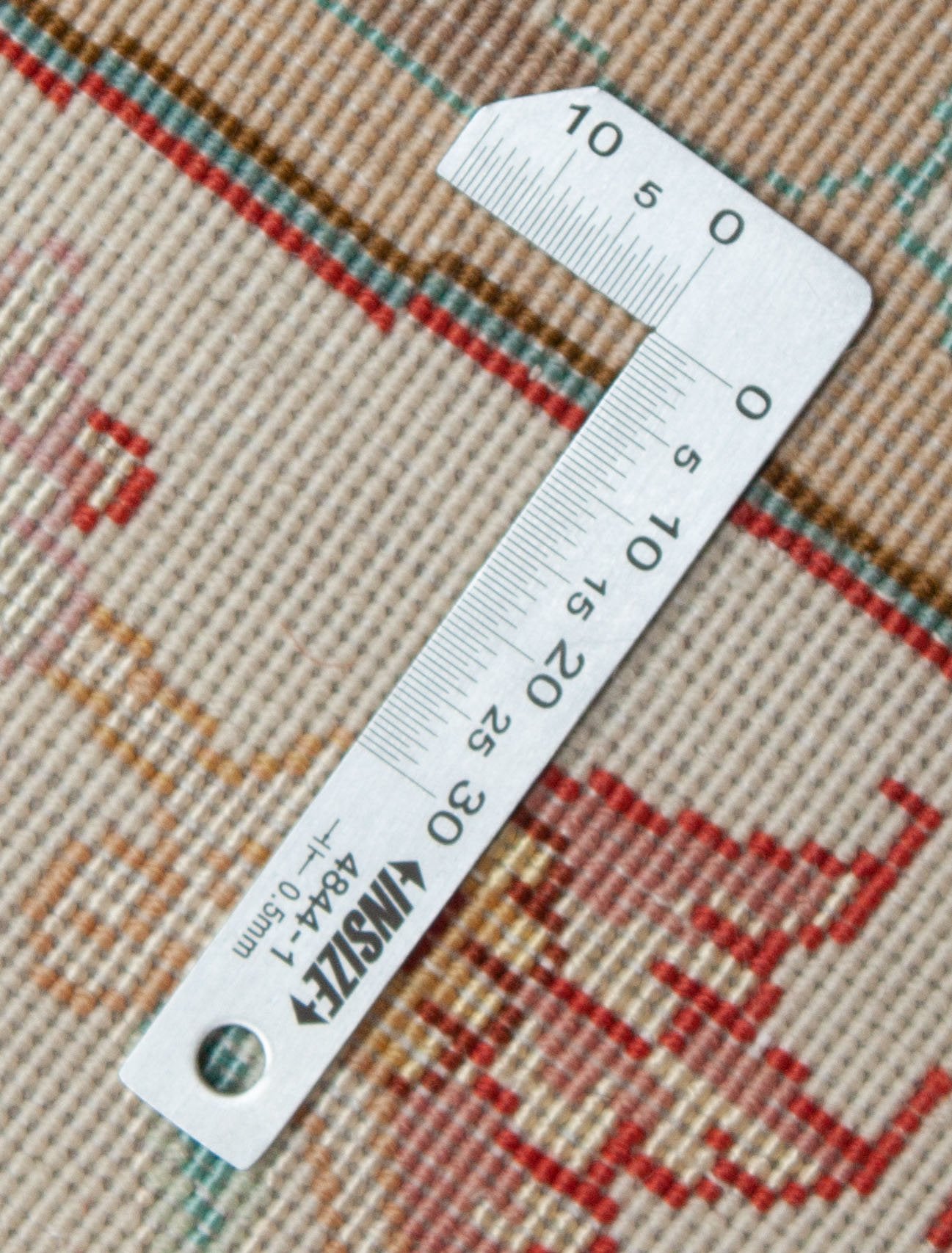 Eine Fotoaufnahme eines Täbriz Teppichs.