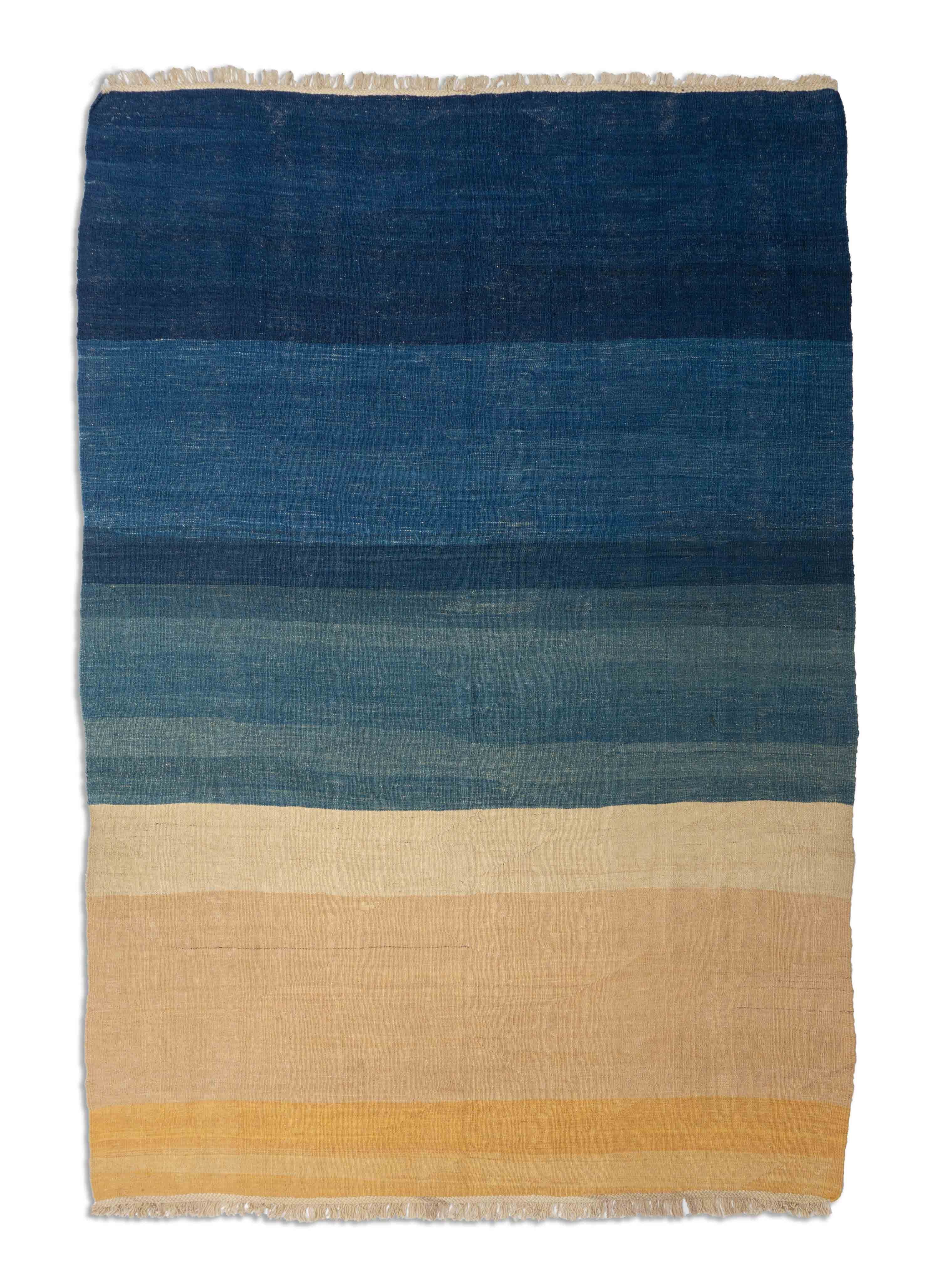 Eine Fotoaufnahme eines Kelim Teppichs.