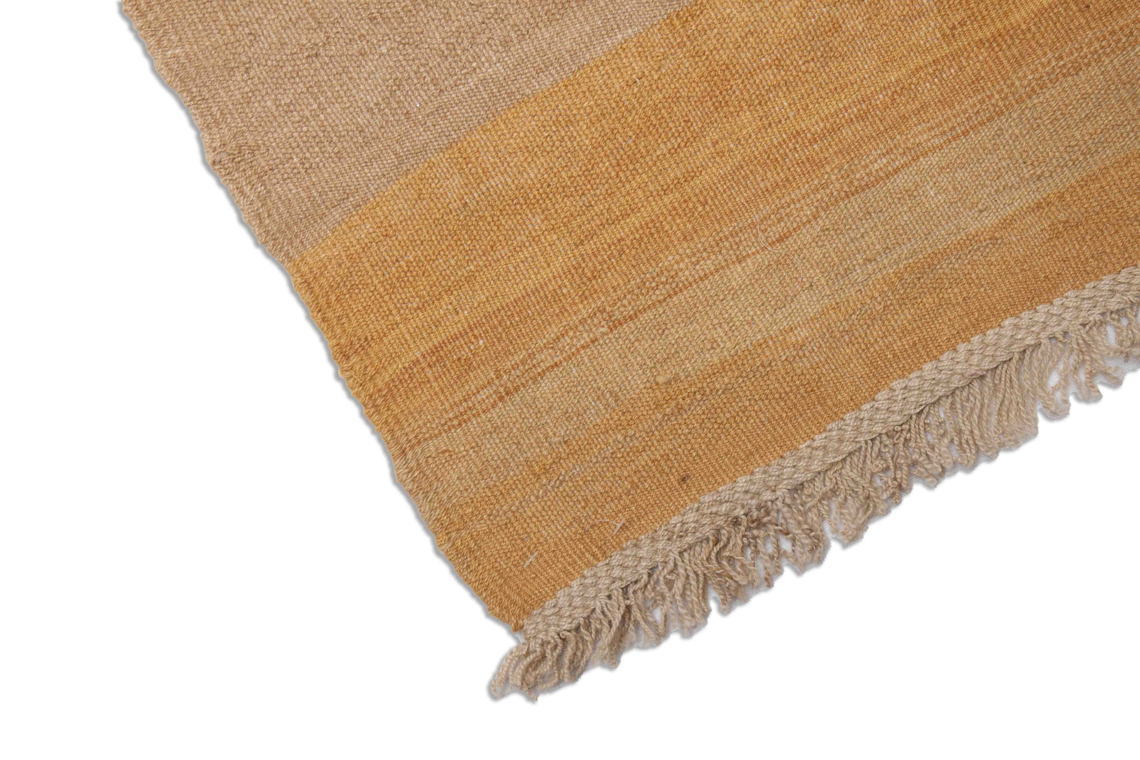 Eine Fotoaufnahme eines Kelim Teppichs.