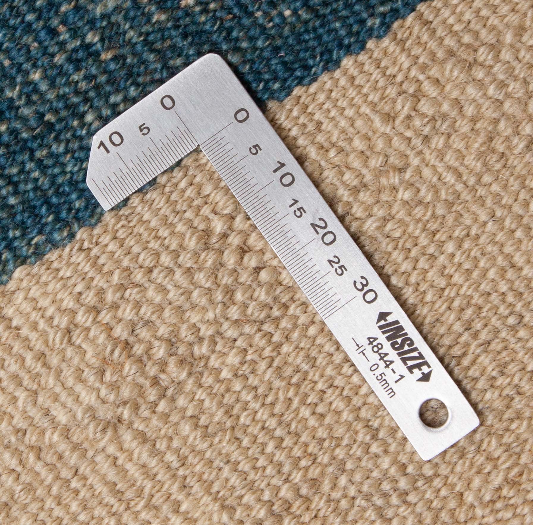 Eine Fotoaufnahme eines Kelim Teppichs.