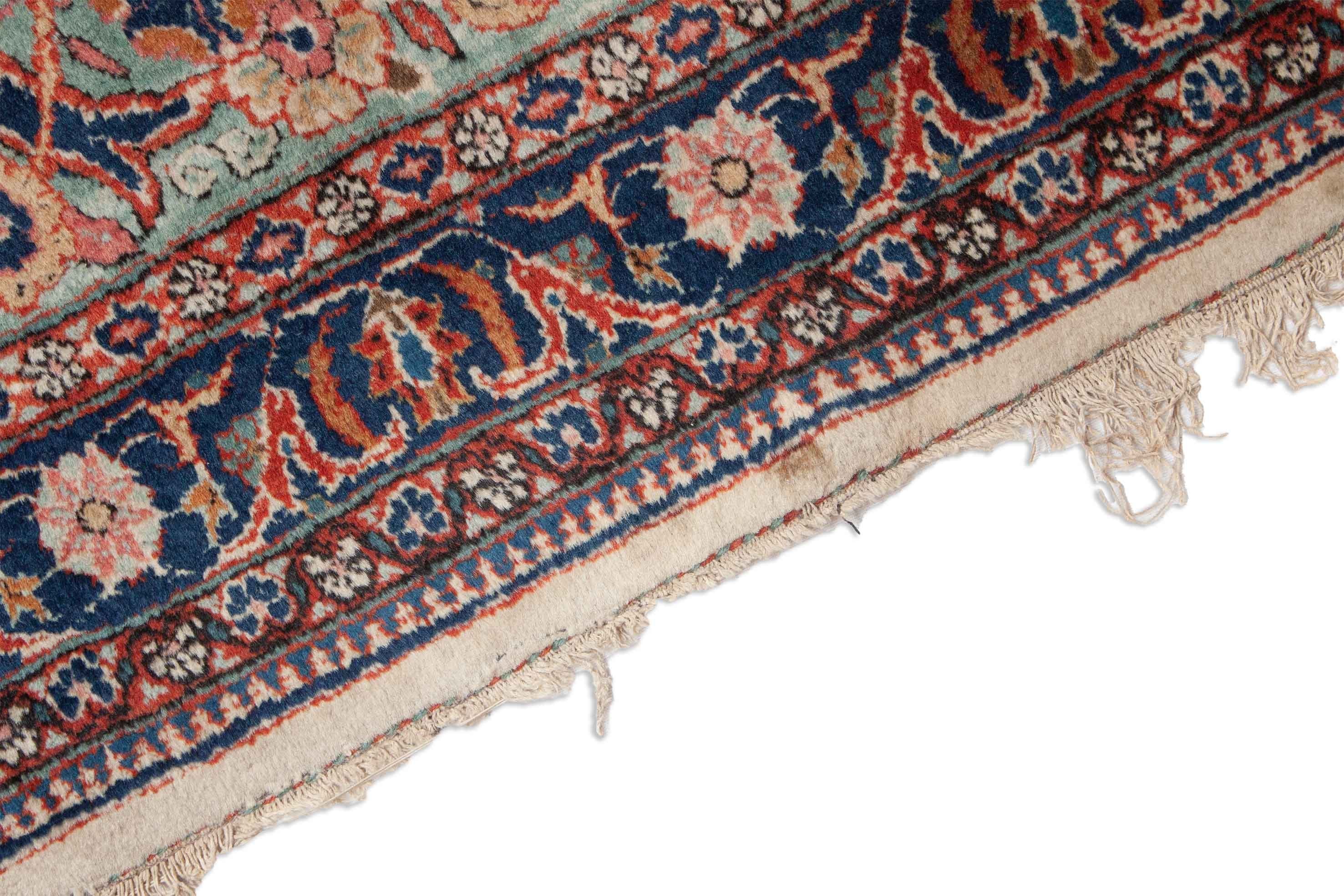 Eine Fotoaufnahme eines Keshan Teppichs.