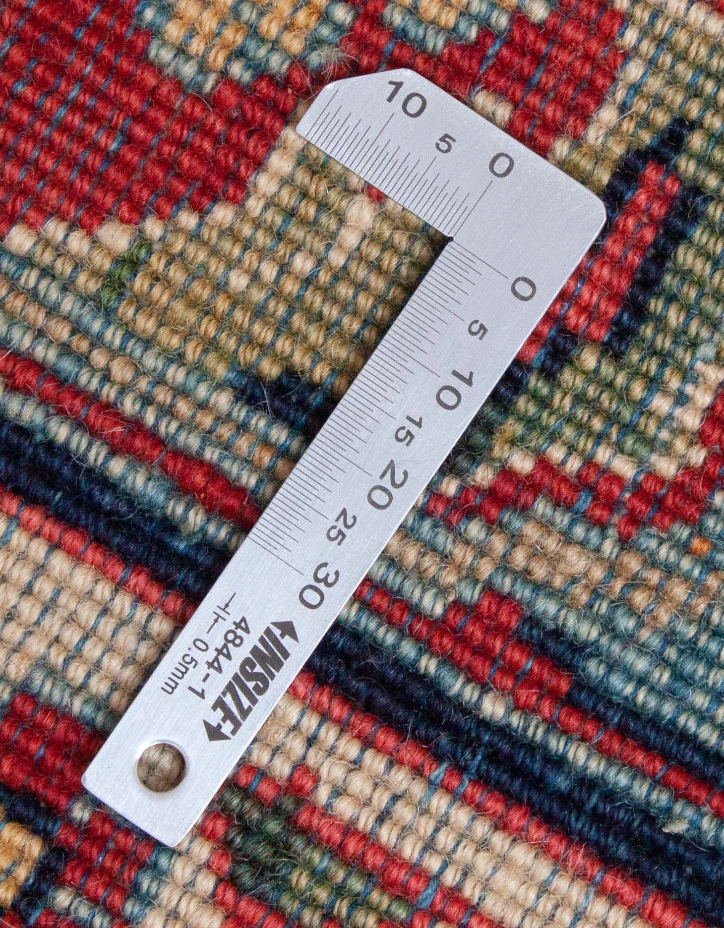 Eine Fotoaufnahme eines Sarough Teppichs.