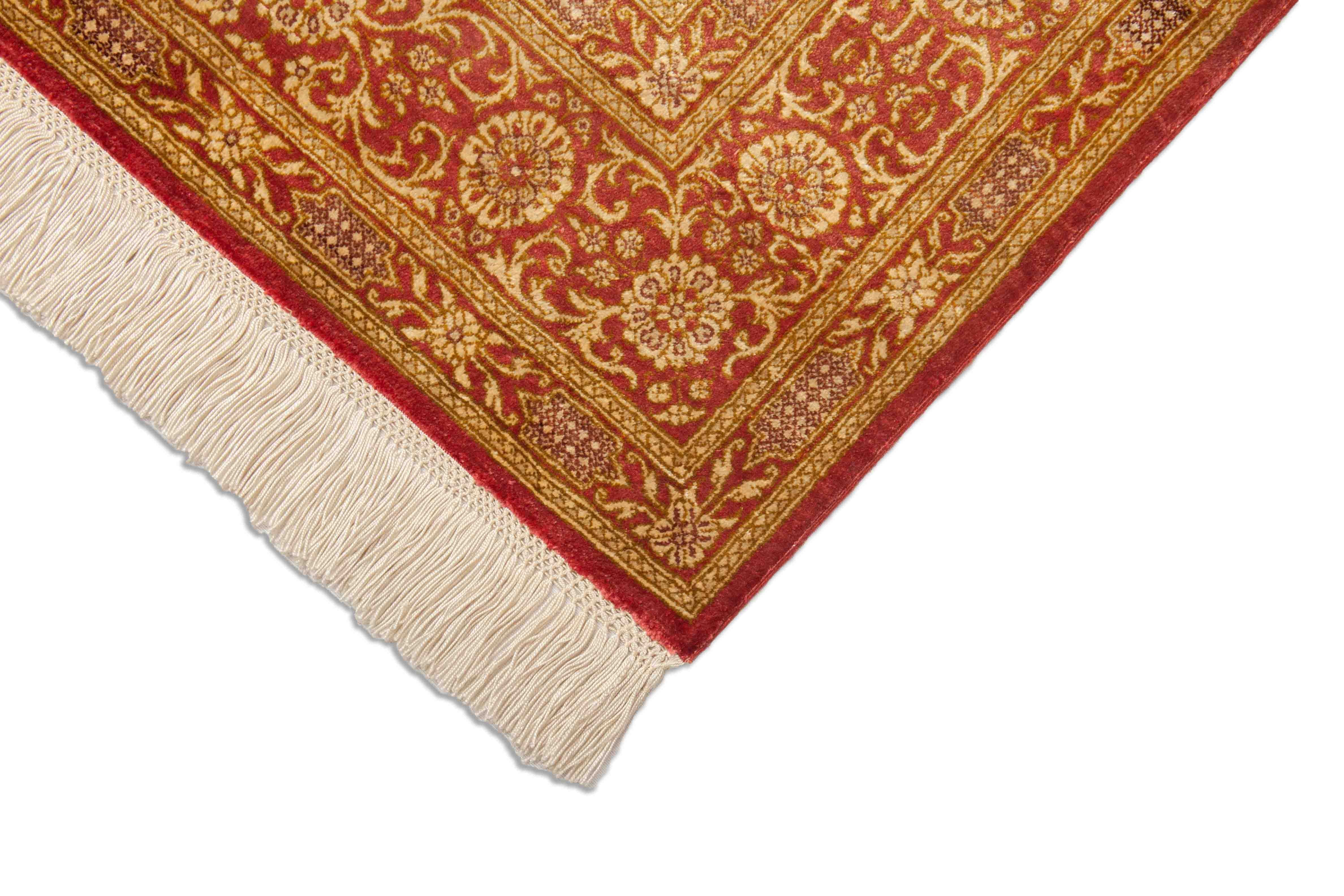 Eine Fotoaufnahme eines Ghom Teppichs.