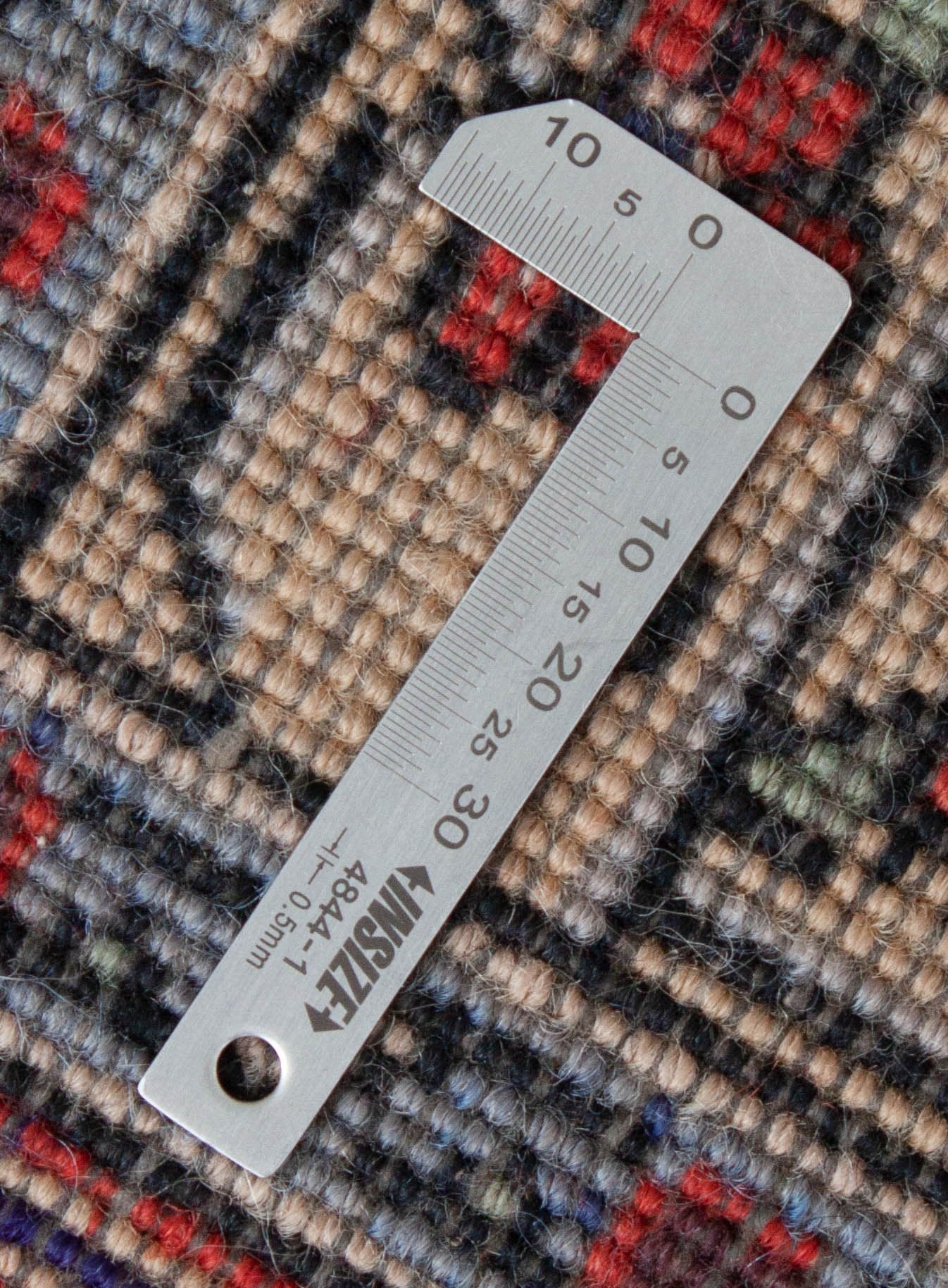 Eine Fotoaufnahme eines Täbriz Teppichs.