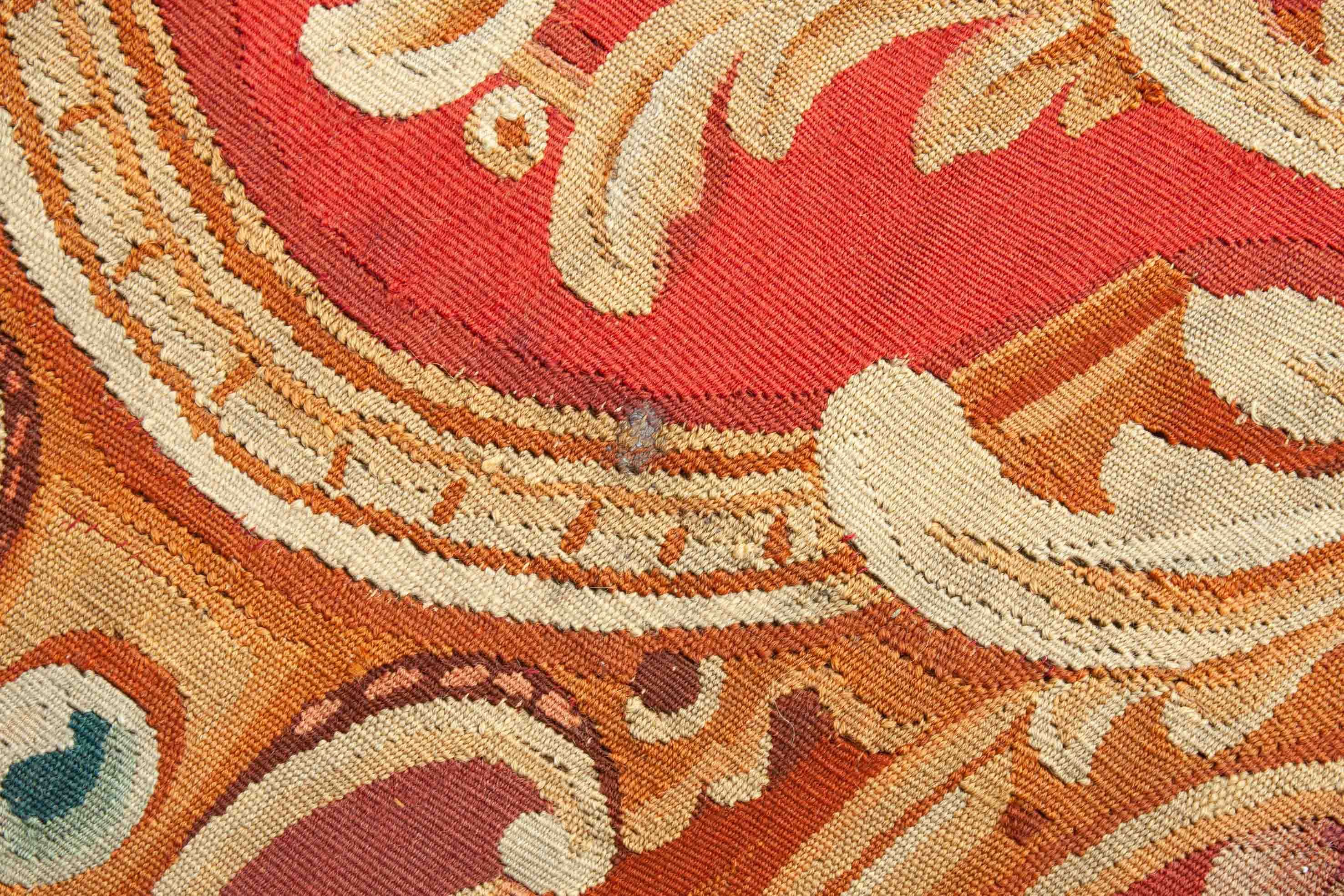 Eine Fotoaufnahme eines Aubusson Teppichs.