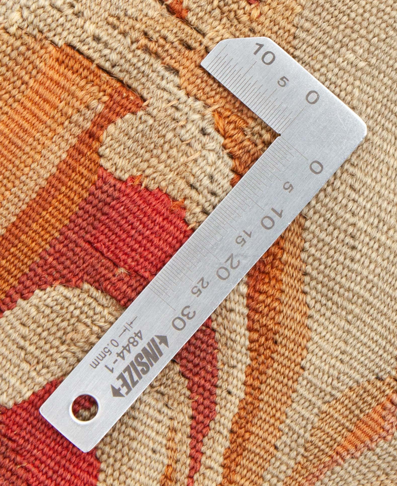 Eine Fotoaufnahme eines Aubusson Teppichs.