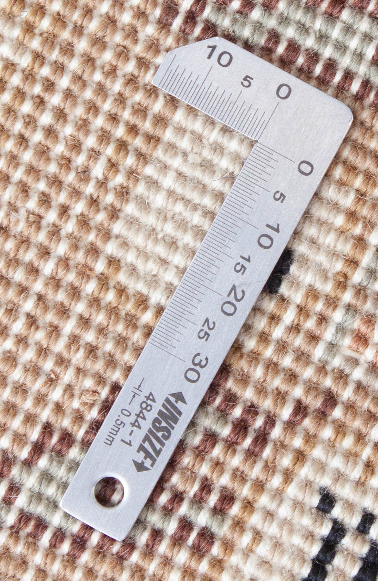 Eine Fotoaufnahme eines Täbriz Teppichs.