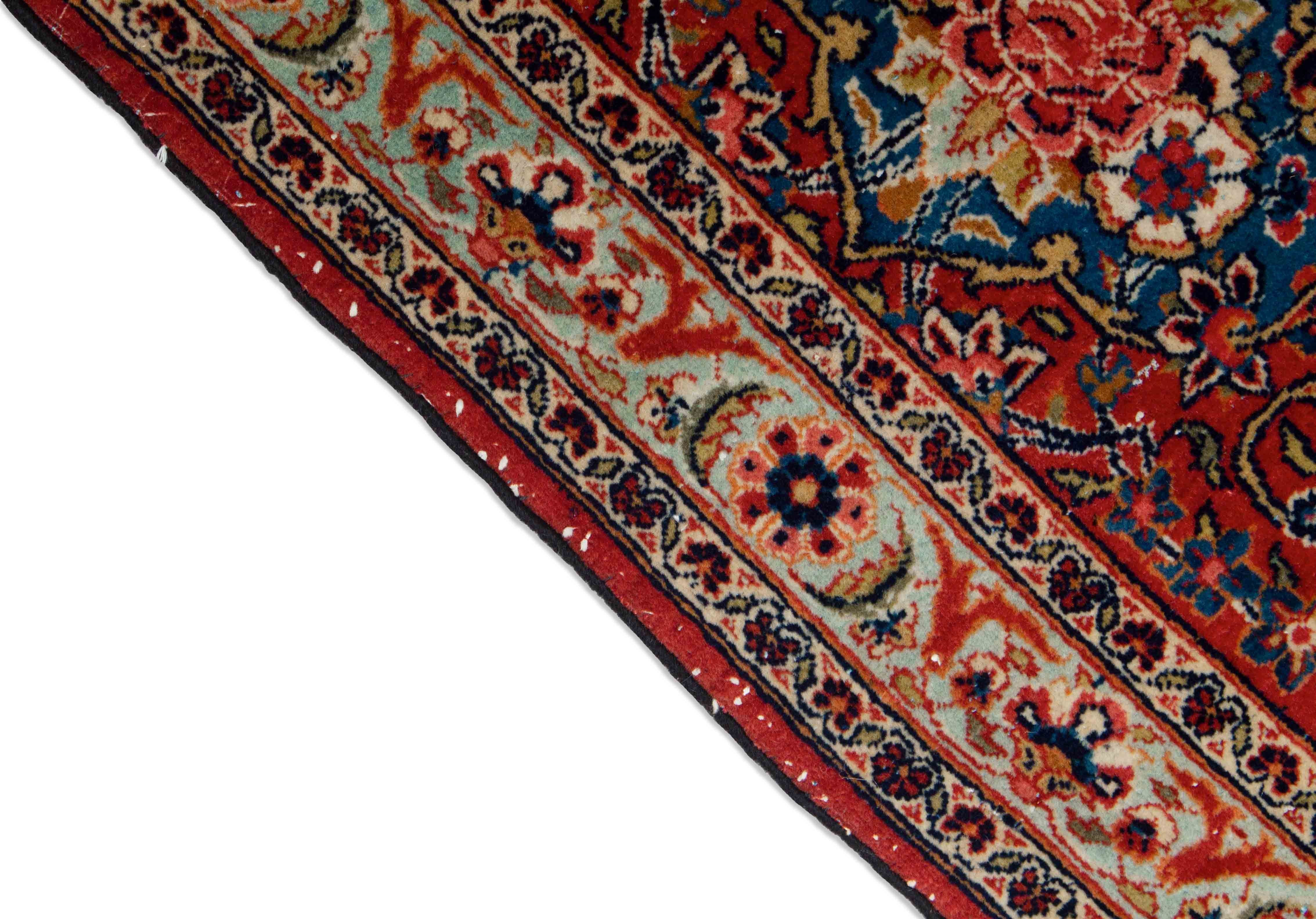 Eine Fotoaufnahme eines Keshan Teppichs.