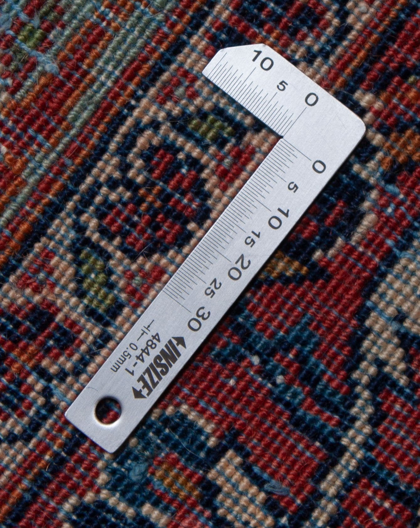 Eine Fotoaufnahme eines Keshan Teppichs.