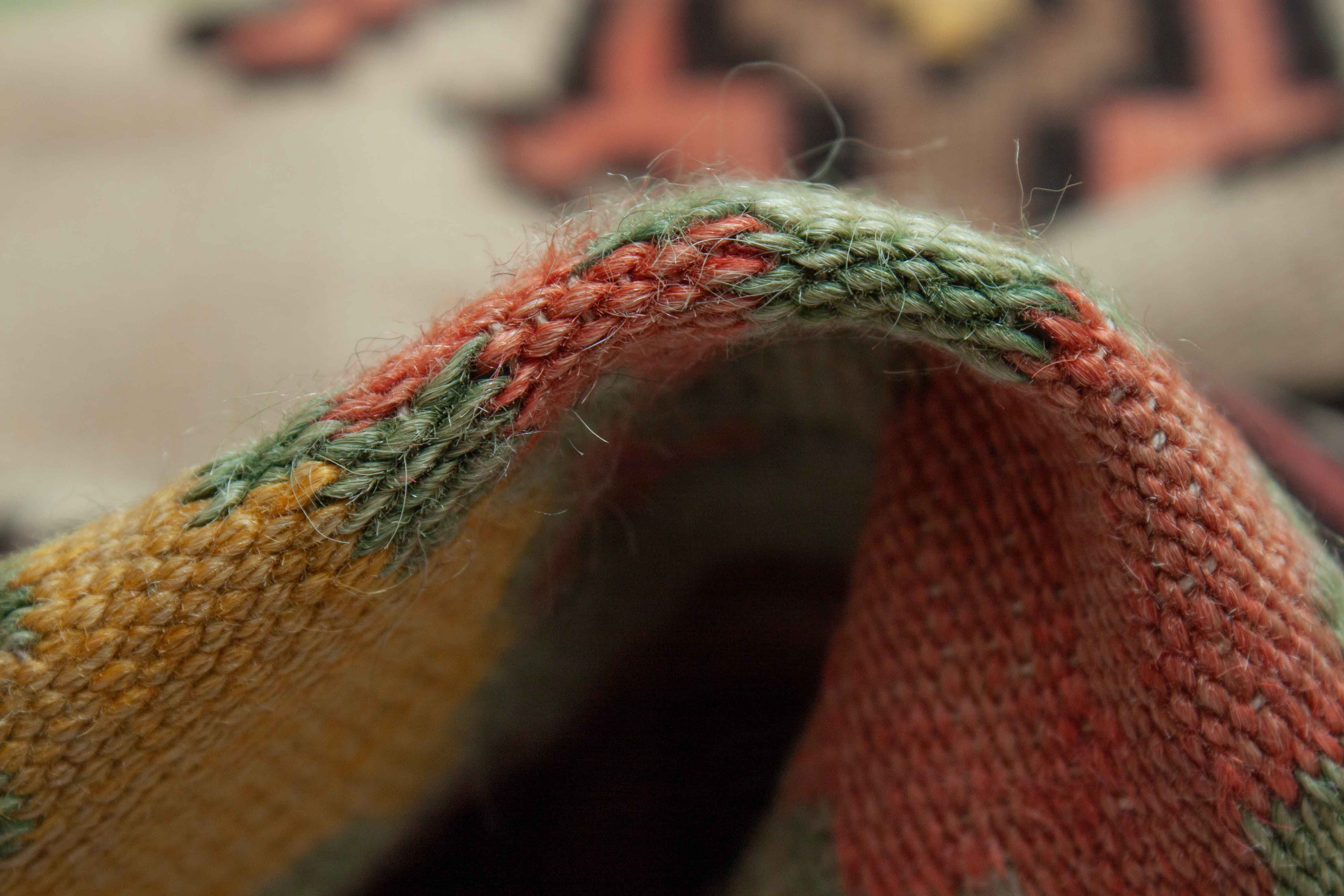 Eine Fotoaufnahme eines Kelim Teppichs.