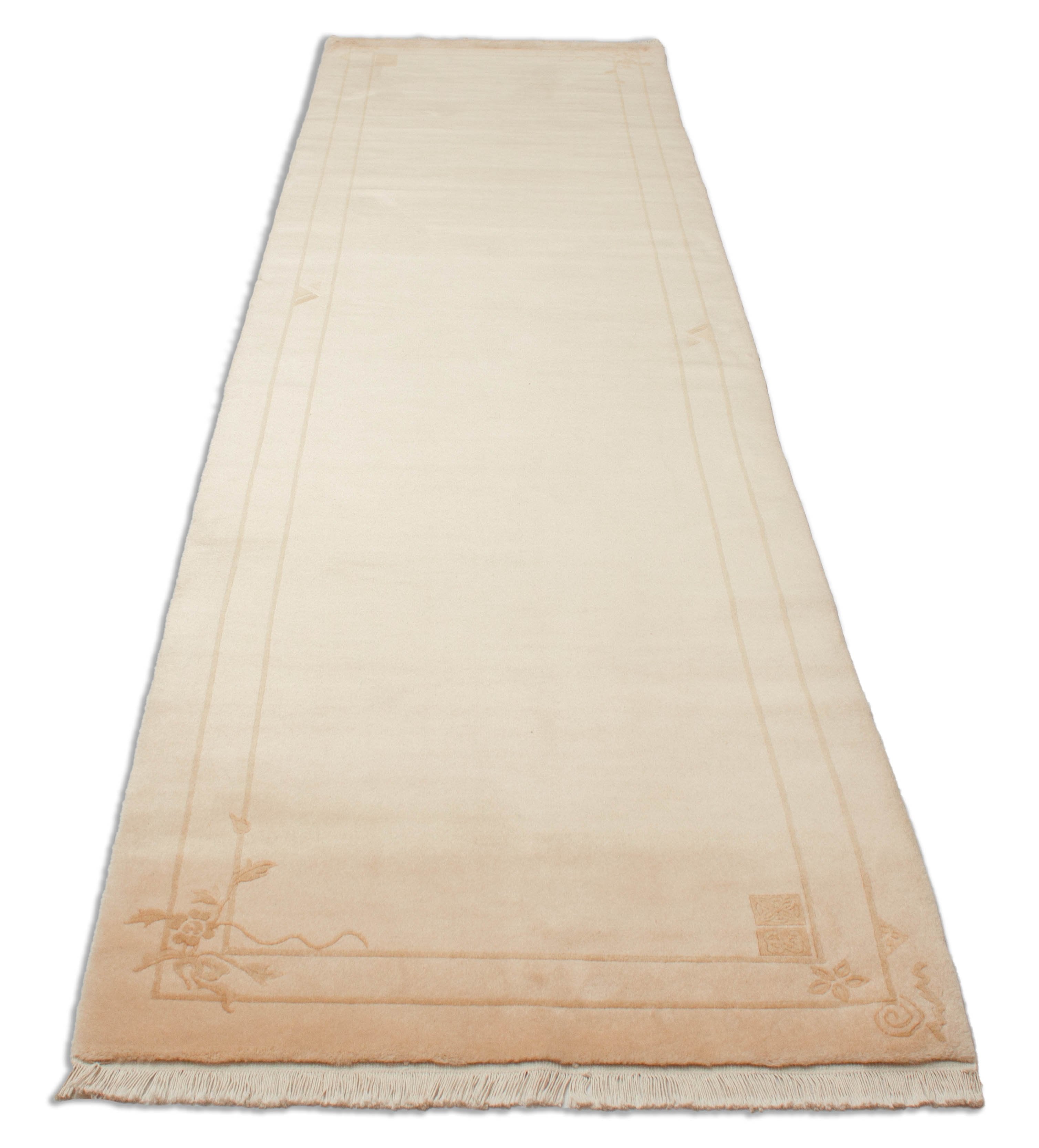 Eine Fotoaufnahme eines China Teppich Teppichs.