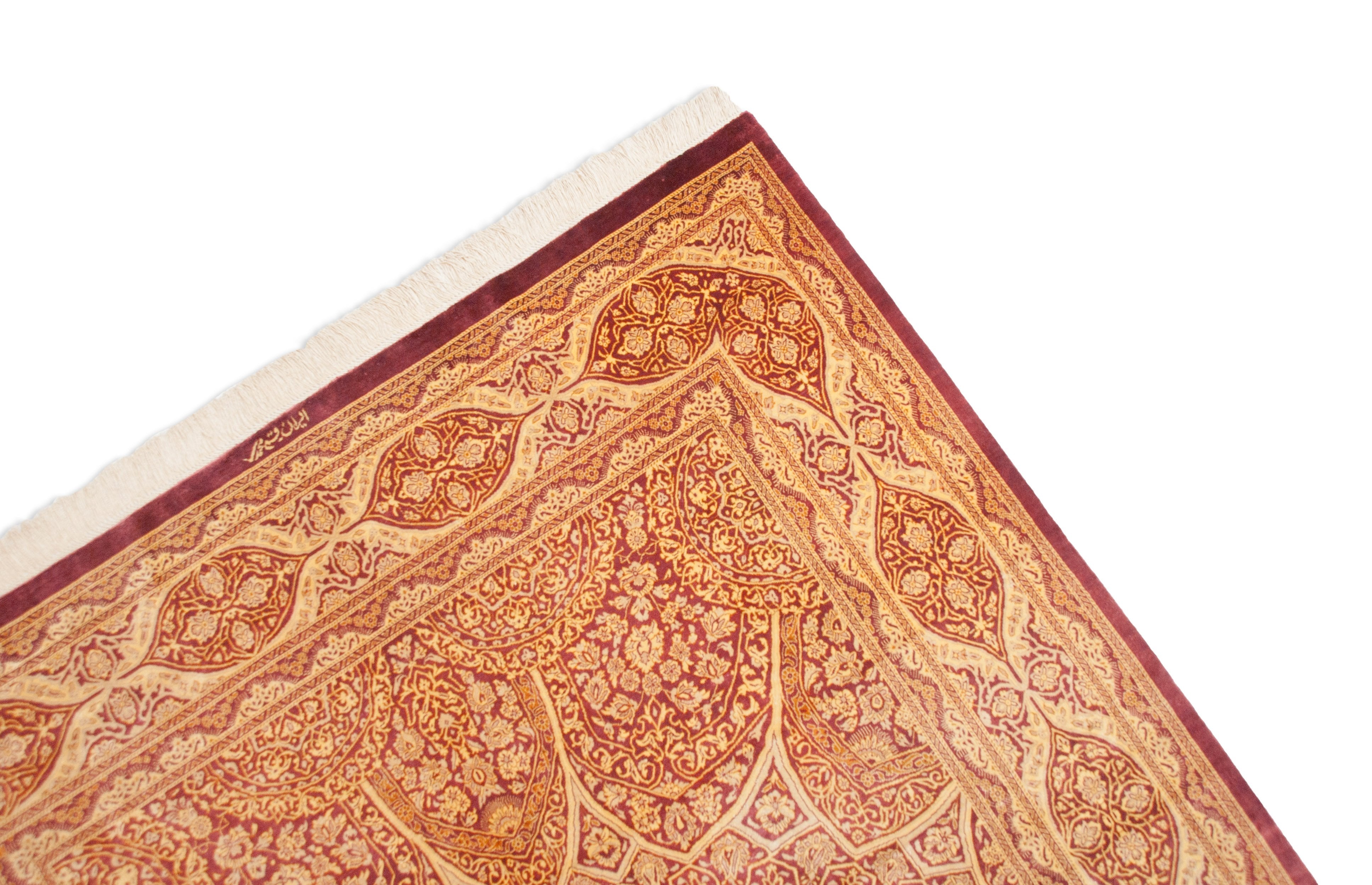 Eine Fotoaufnahme eines Ghom Teppichs.