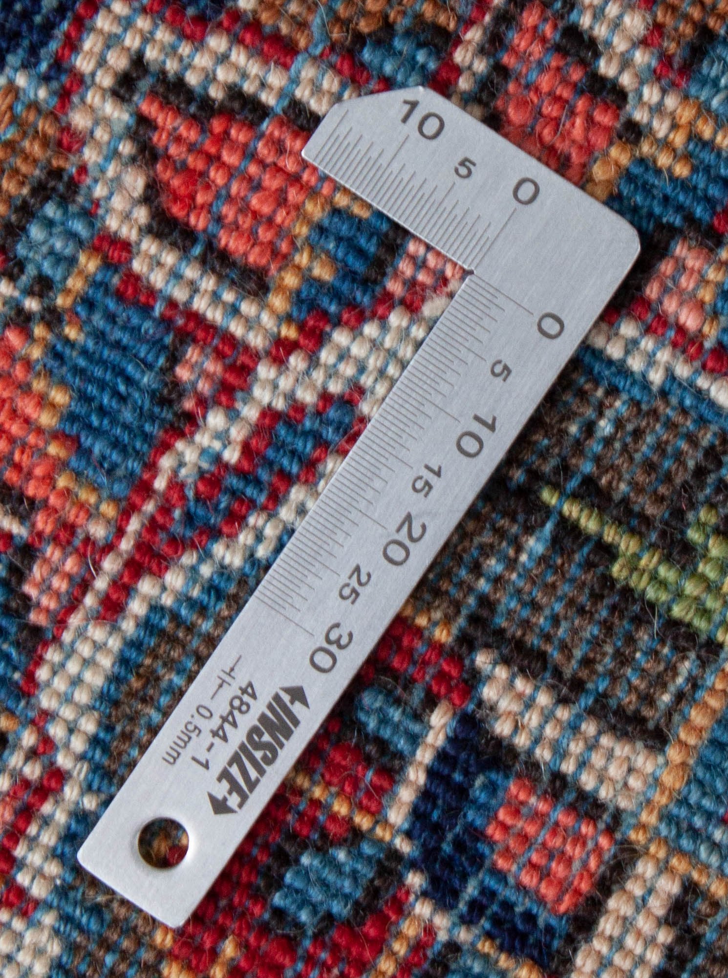 Eine Fotoaufnahme eines Keshan Teppichs.