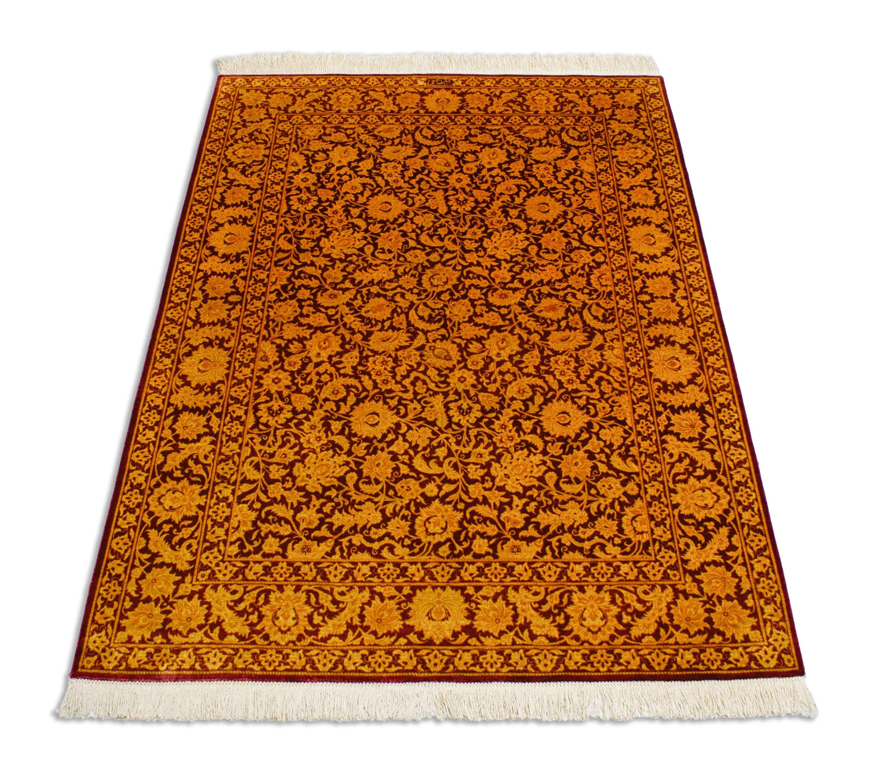 Eine Fotoaufnahme eines Ghom Teppichs.