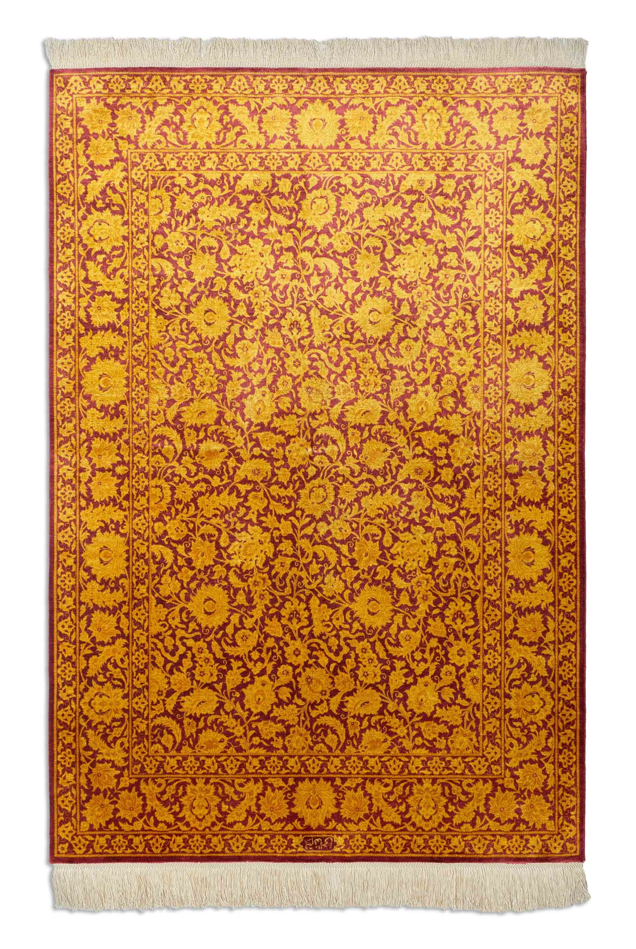 Eine Fotoaufnahme eines Ghom Teppichs.