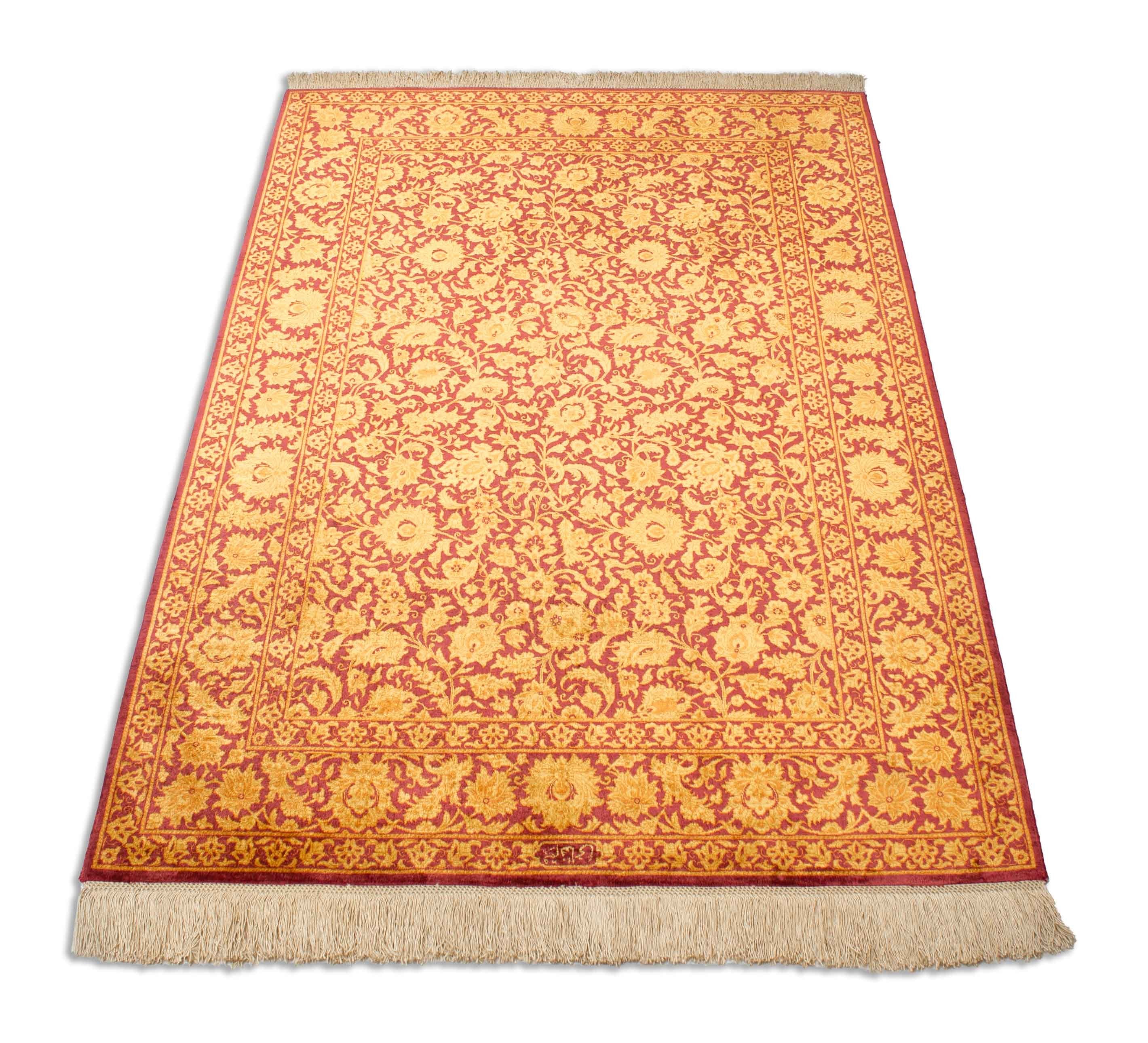 Eine Fotoaufnahme eines Ghom Teppichs.