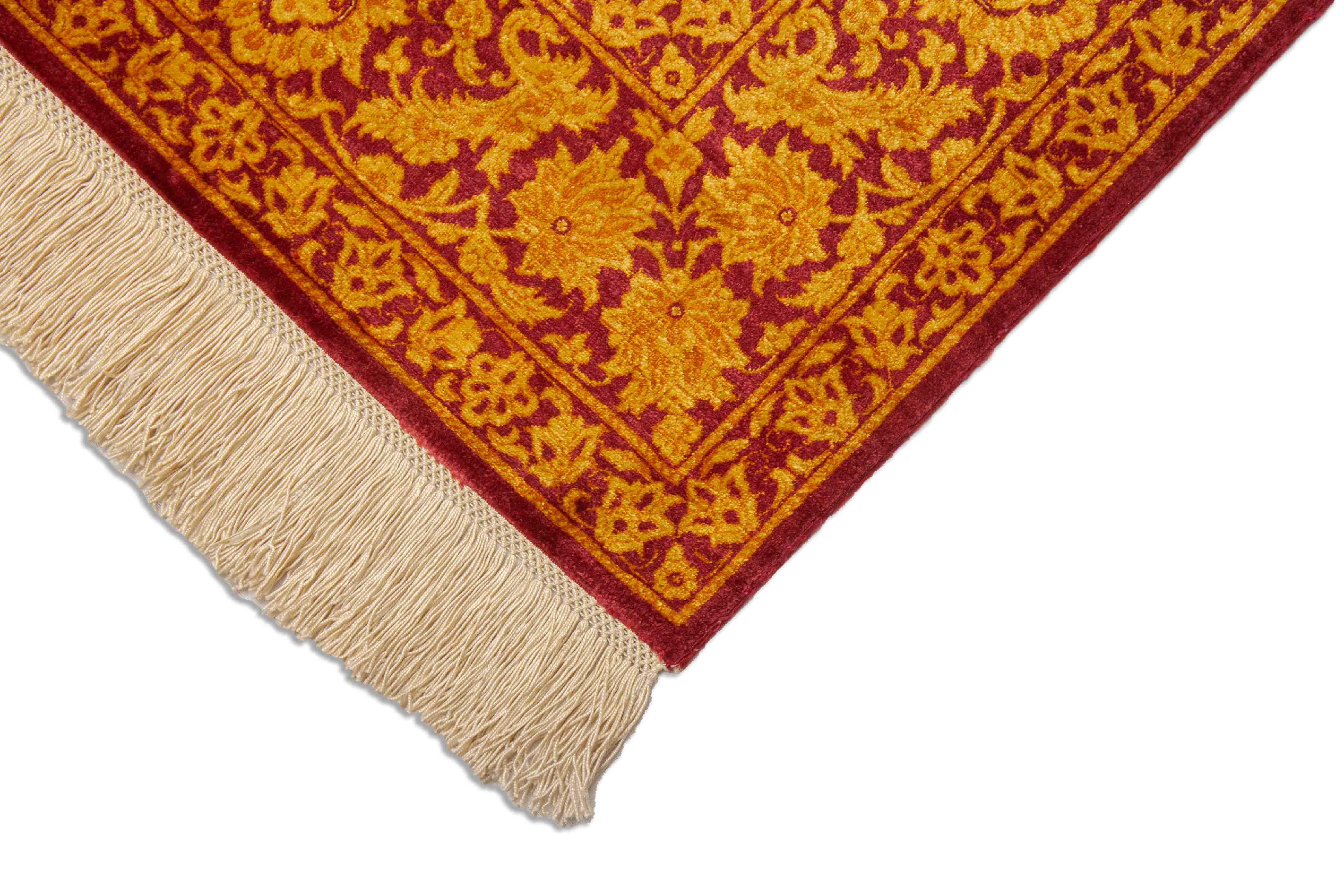 Eine Fotoaufnahme eines Ghom Teppichs.