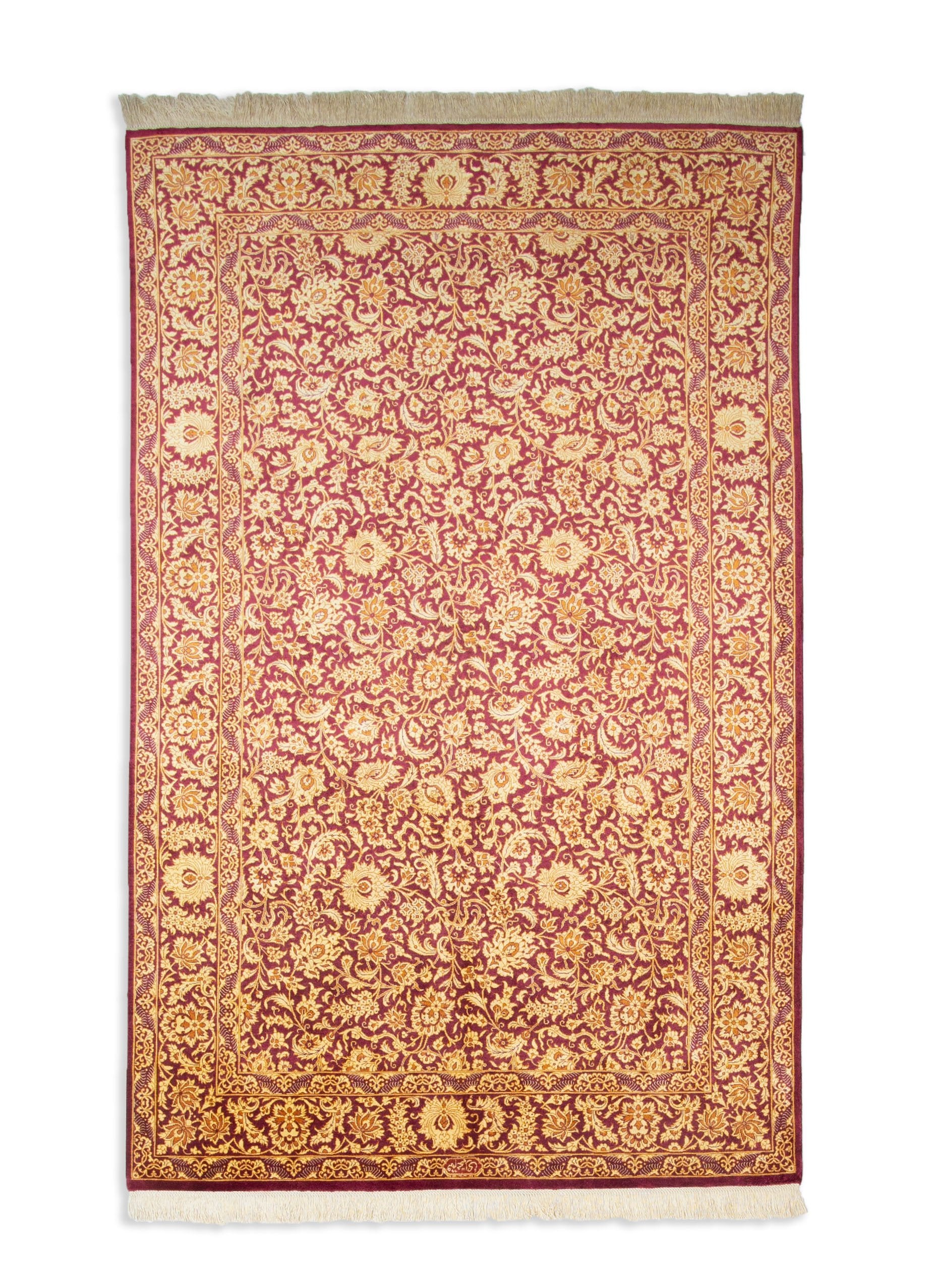 Eine Fotoaufnahme eines Ghom Teppichs.