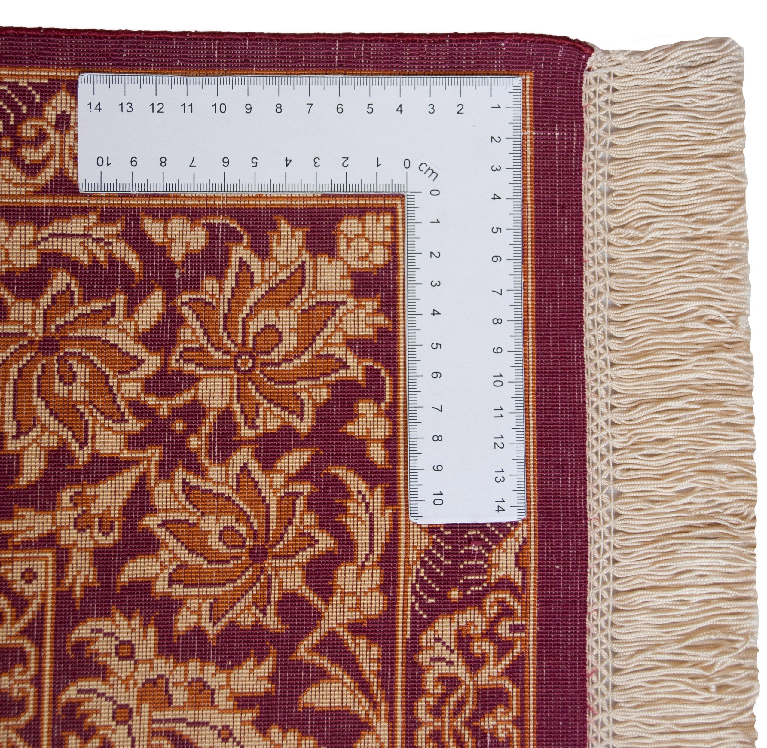 Eine Fotoaufnahme eines Ghom Teppichs.