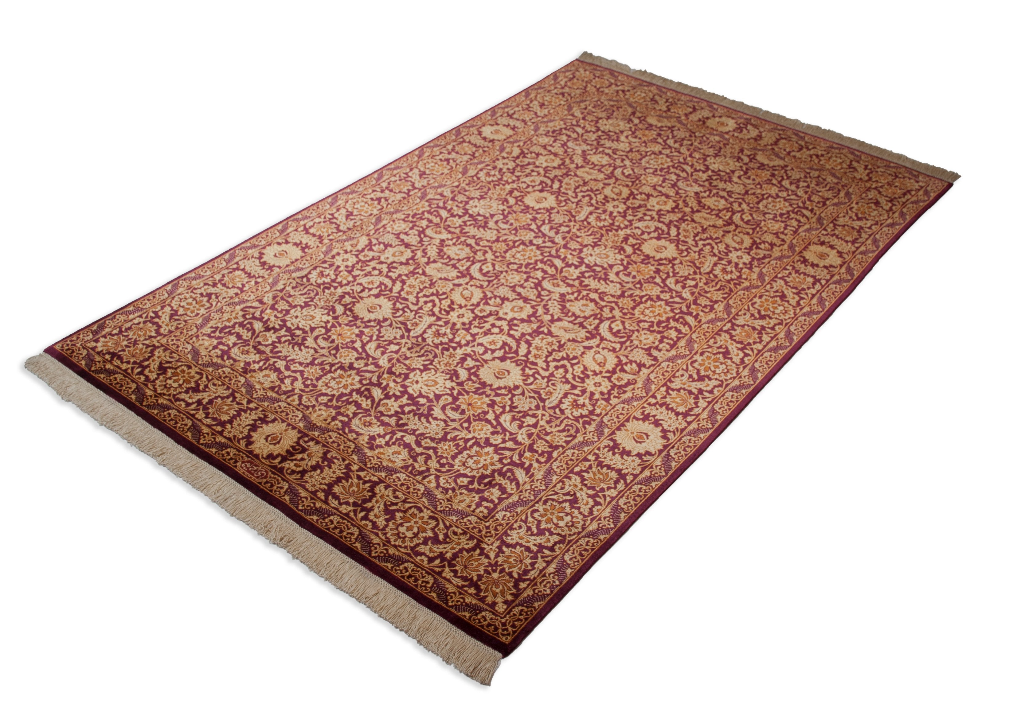 Eine Fotoaufnahme eines Ghom Teppichs.