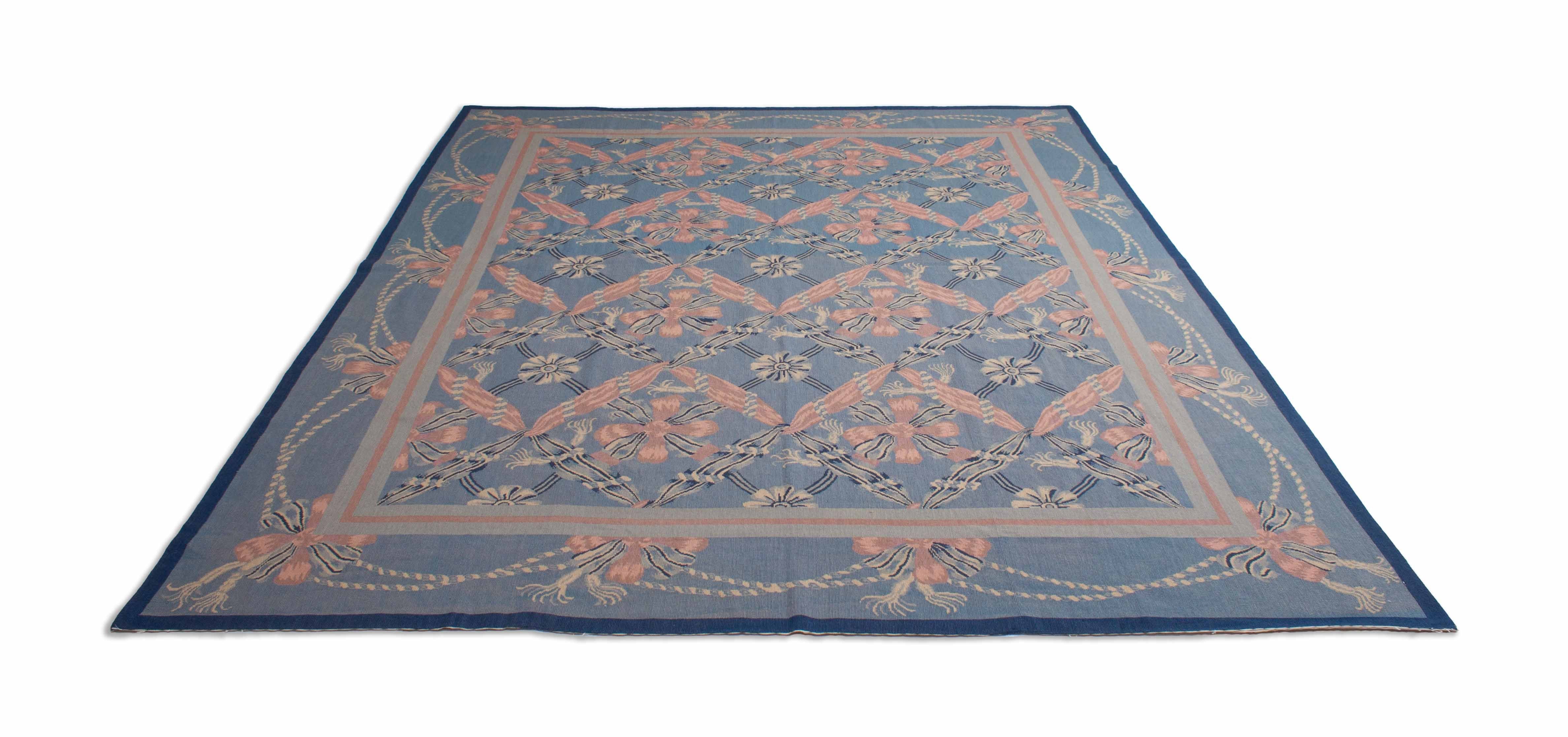 Eine Fotoaufnahme eines Needlepoint Teppichs.