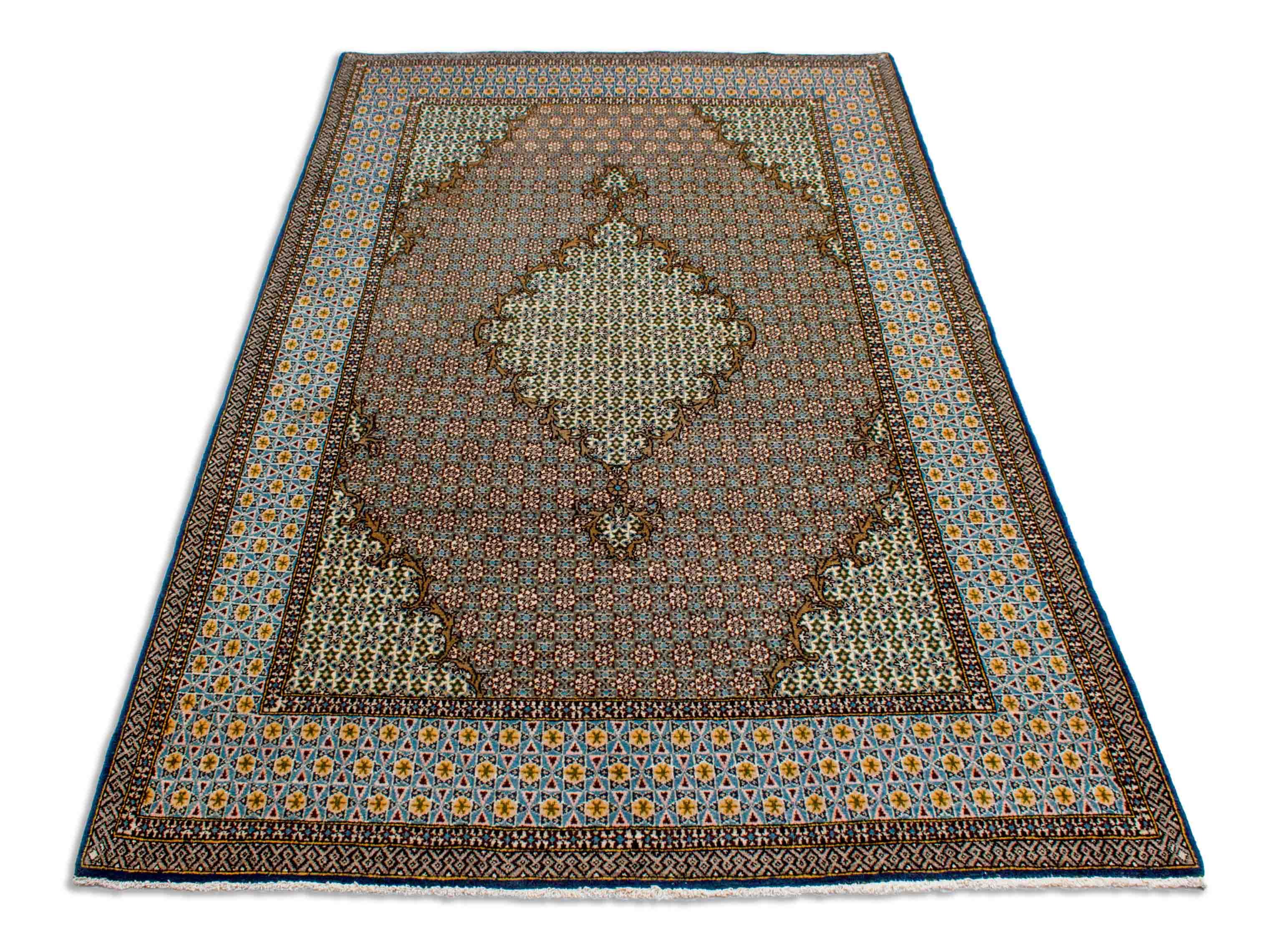 Eine Fotoaufnahme eines Ghom Teppichs.