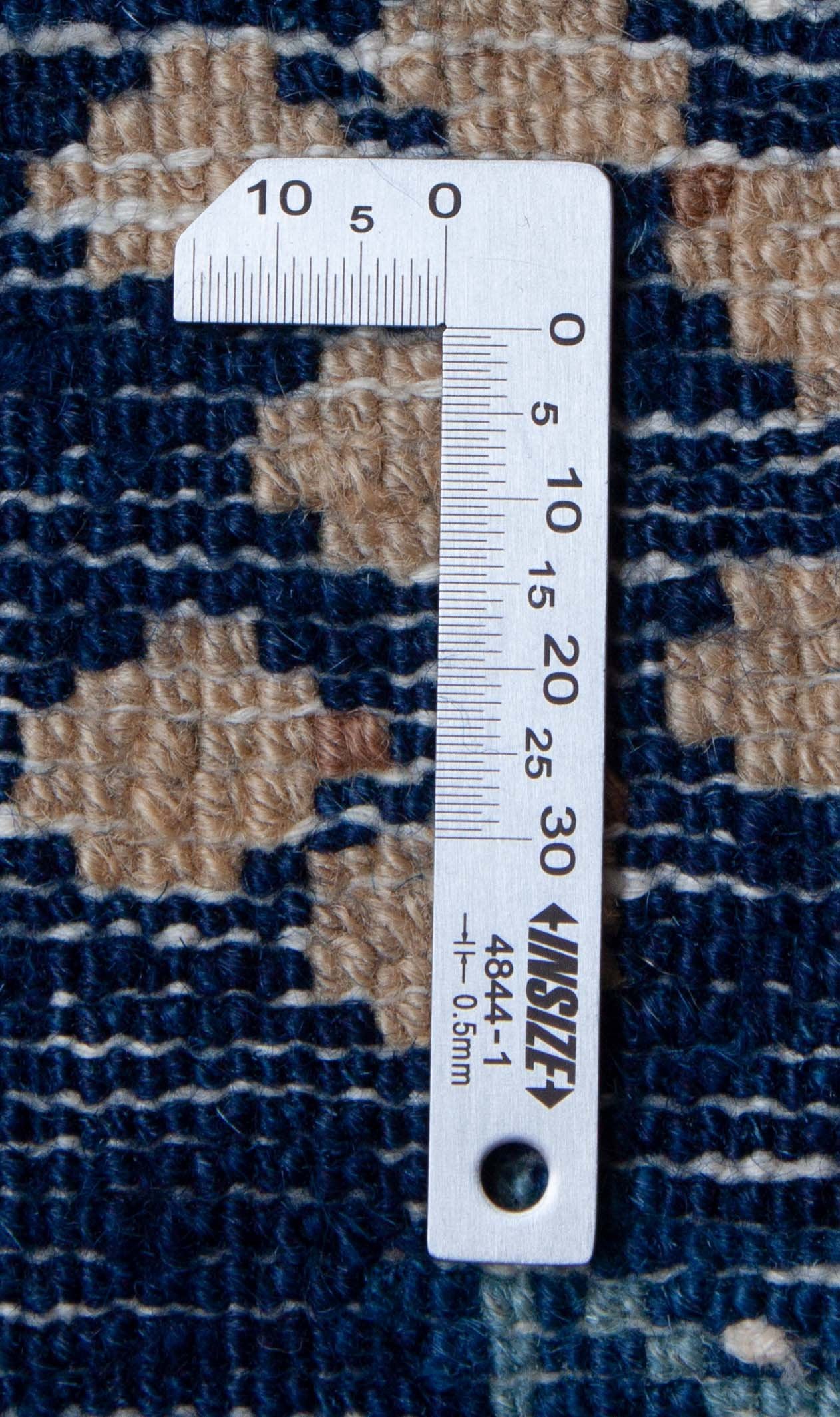 Eine Fotoaufnahme eines US Import China Teppich Teppichs.