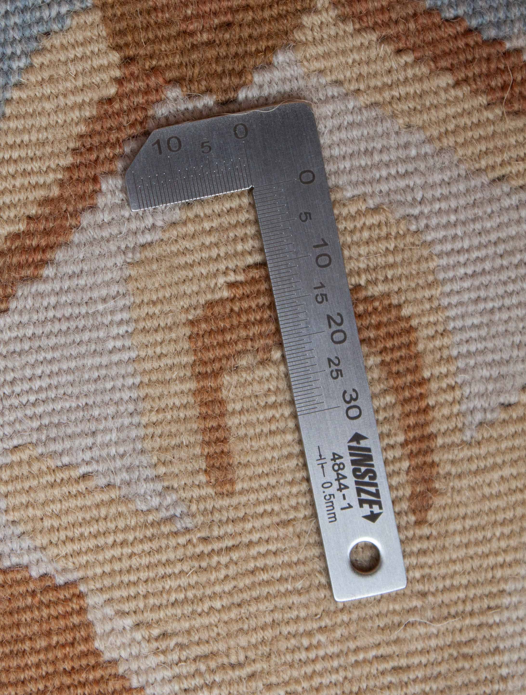 Eine Fotoaufnahme eines Aubusson Teppichs.