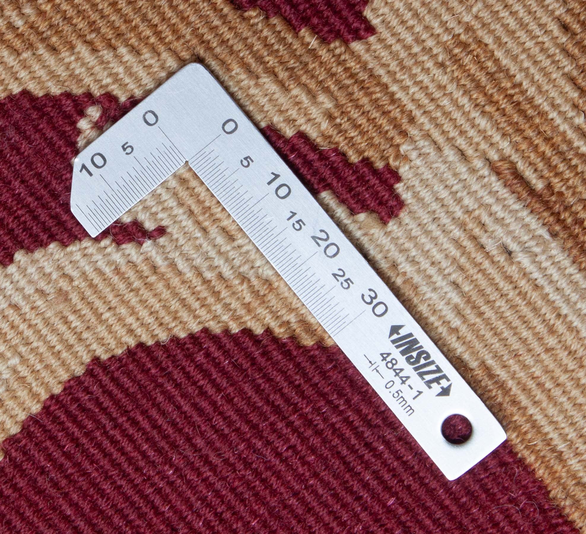 Eine Fotoaufnahme eines Aubusson Teppichs.