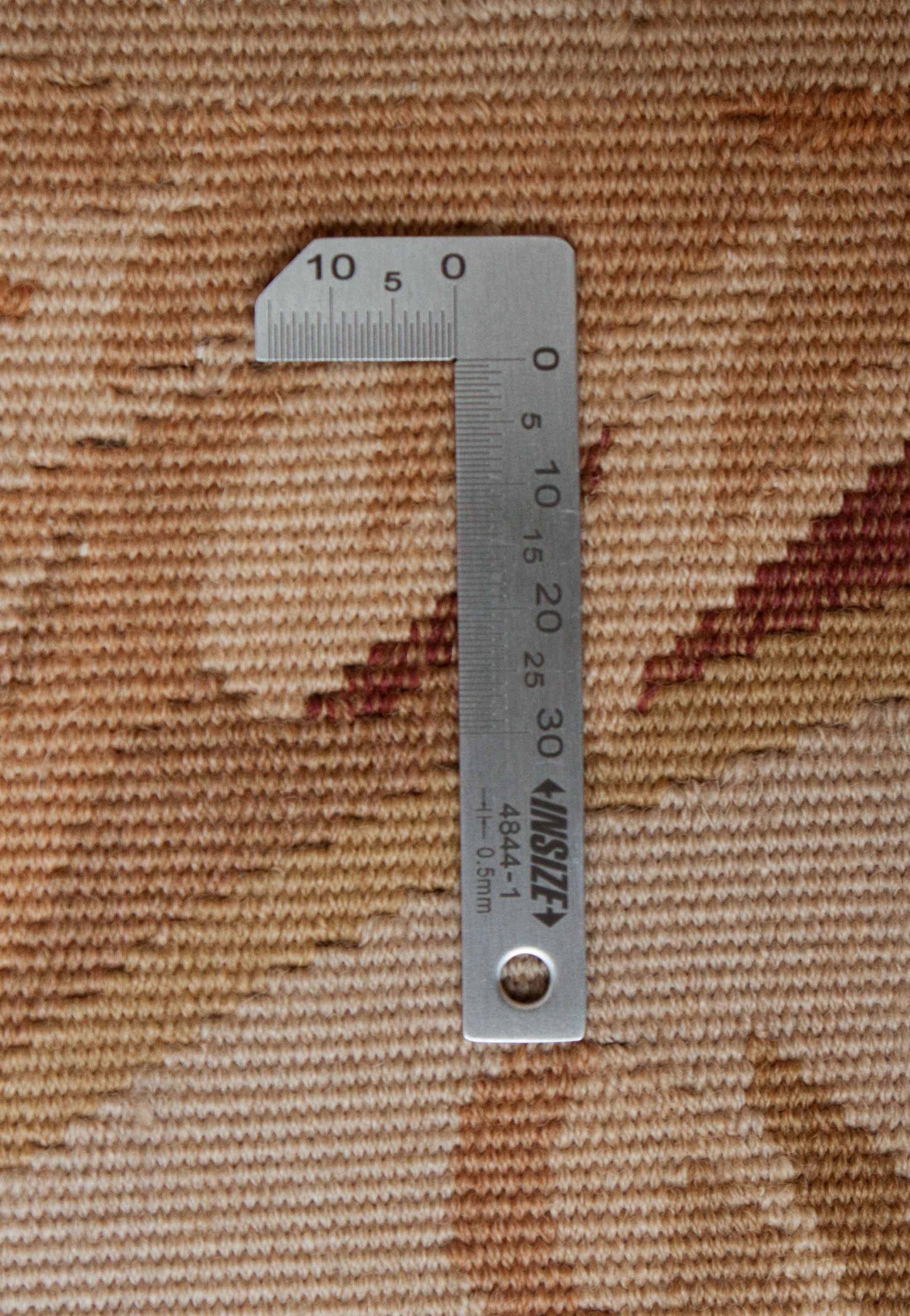 Eine Fotoaufnahme eines Aubusson Teppichs.