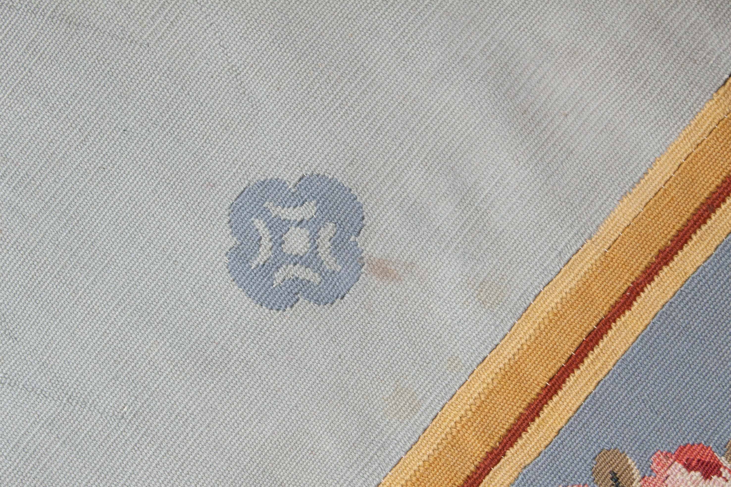 Eine Fotoaufnahme eines Aubusson Teppichs.