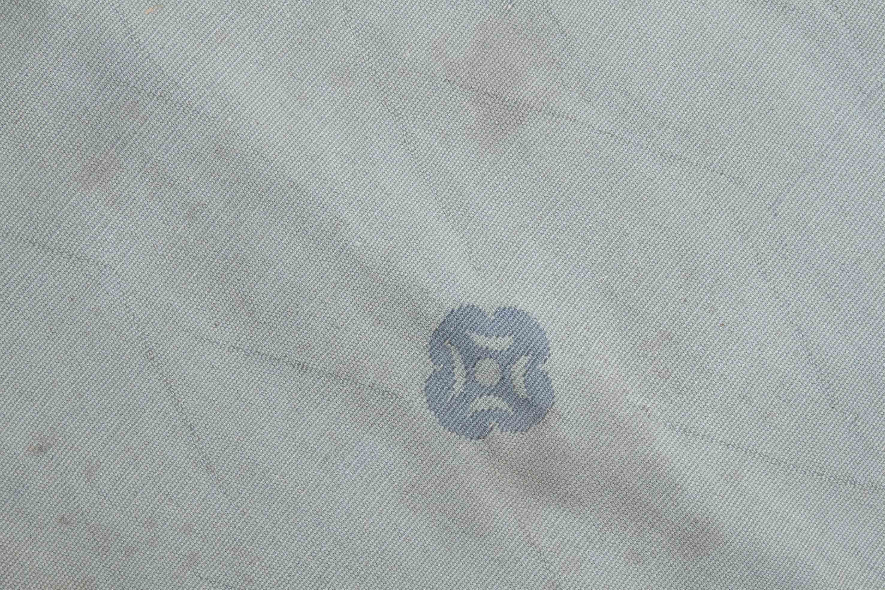 Eine Fotoaufnahme eines Aubusson Teppichs.