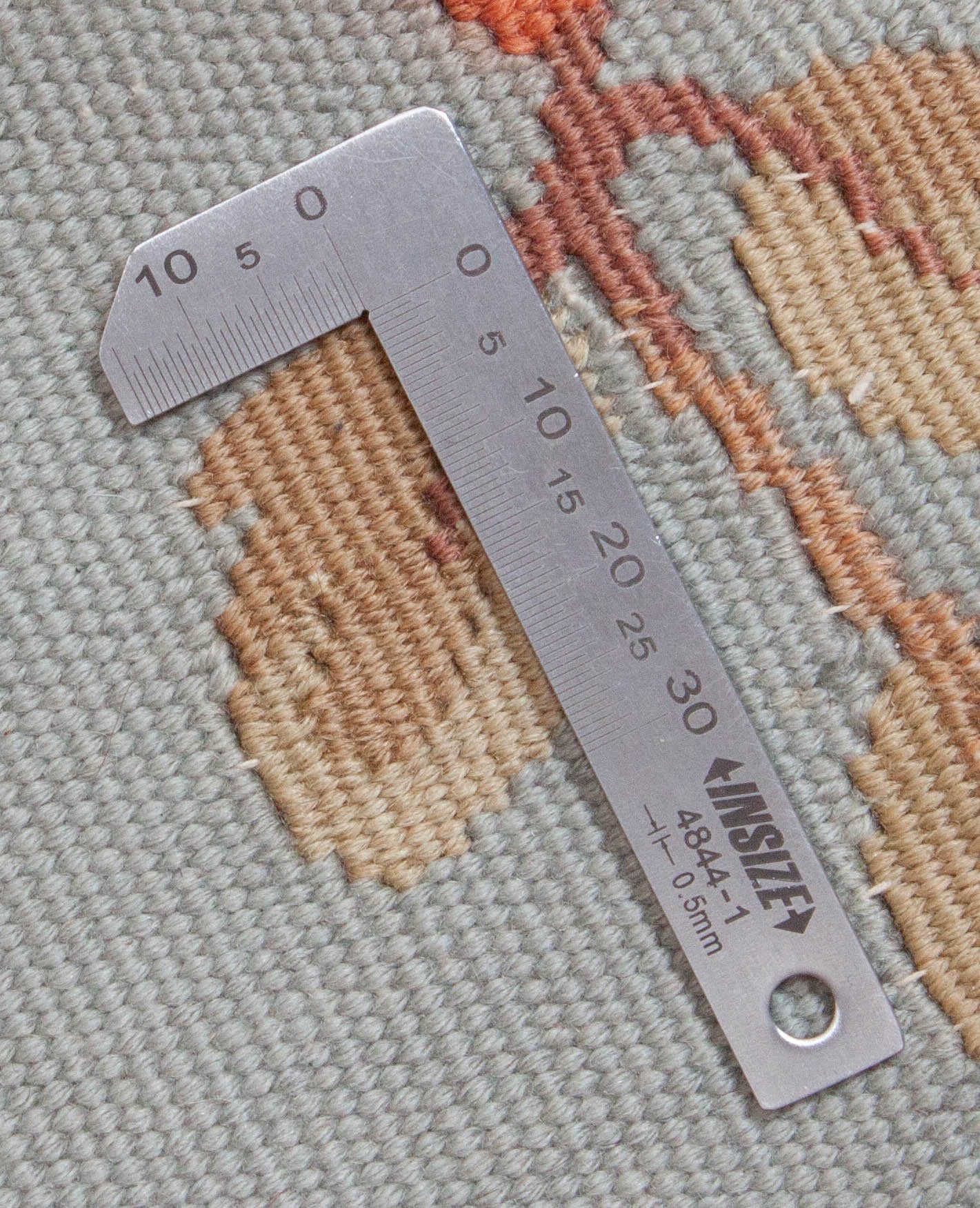 Eine Fotoaufnahme eines Aubusson Teppichs.