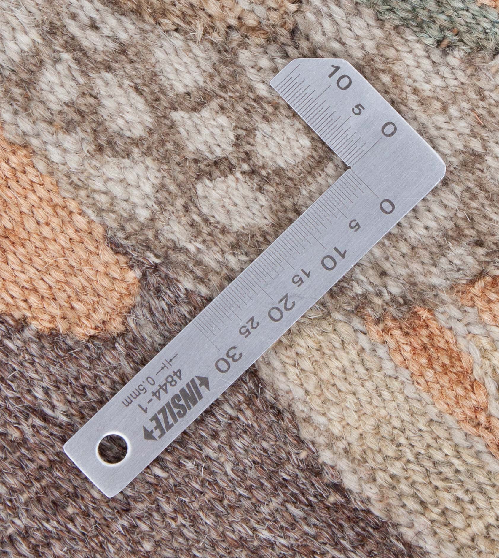 Eine Fotoaufnahme eines Japanischer Kelim Teppichs.