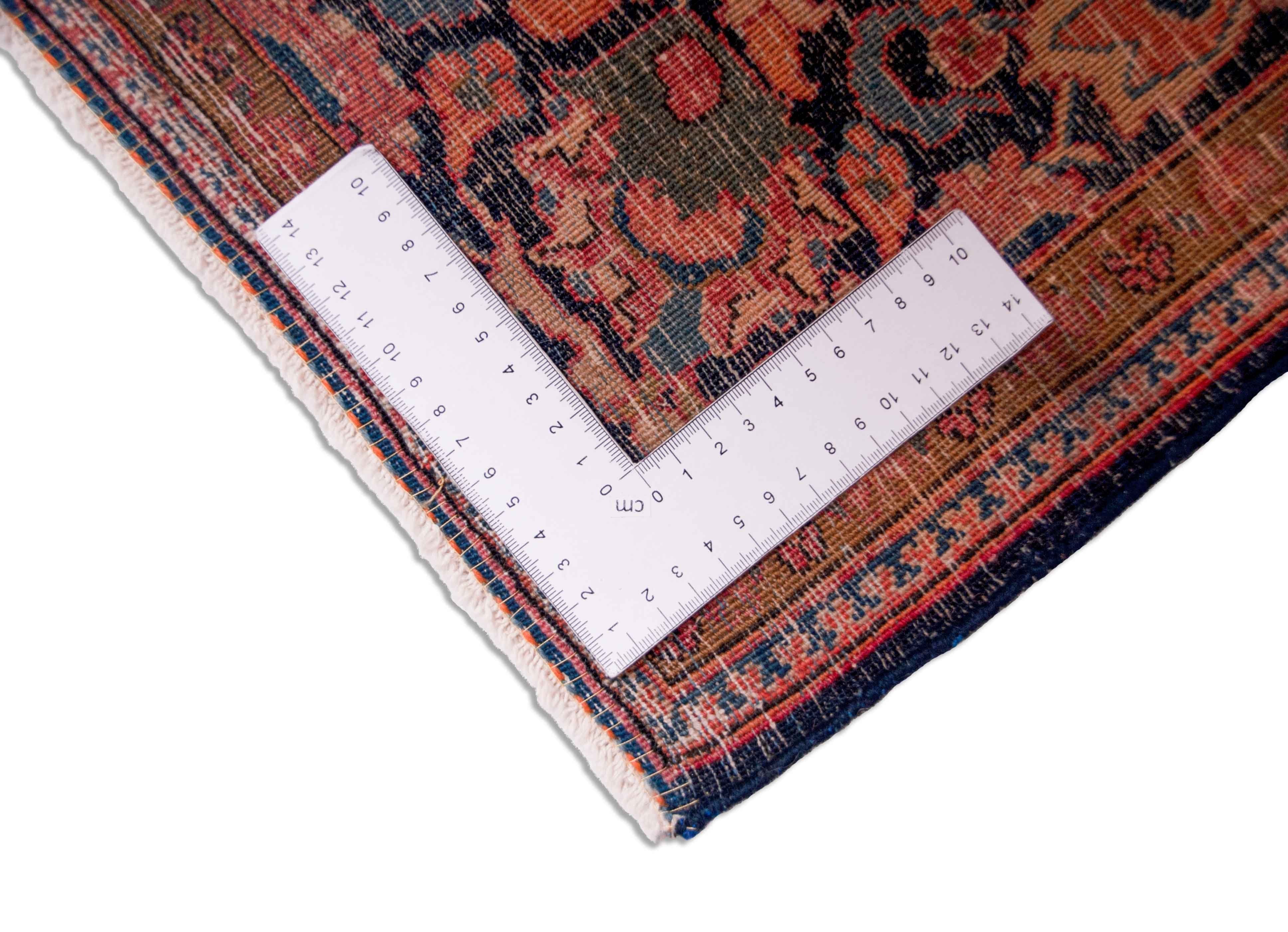 Eine Fotoaufnahme eines Keshan Teppichs.