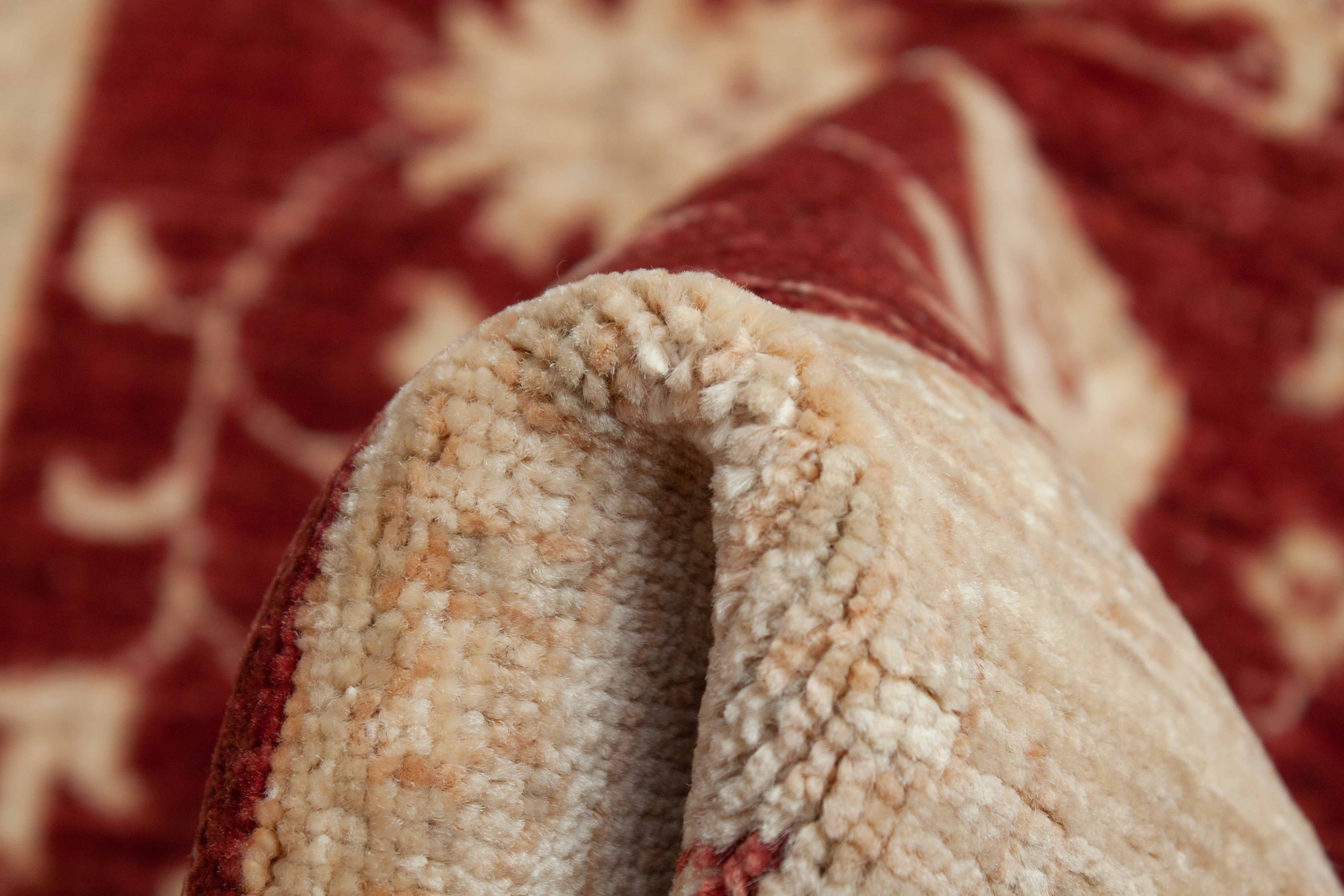 Eine Fotoaufnahme eines Farahan Teppichs.