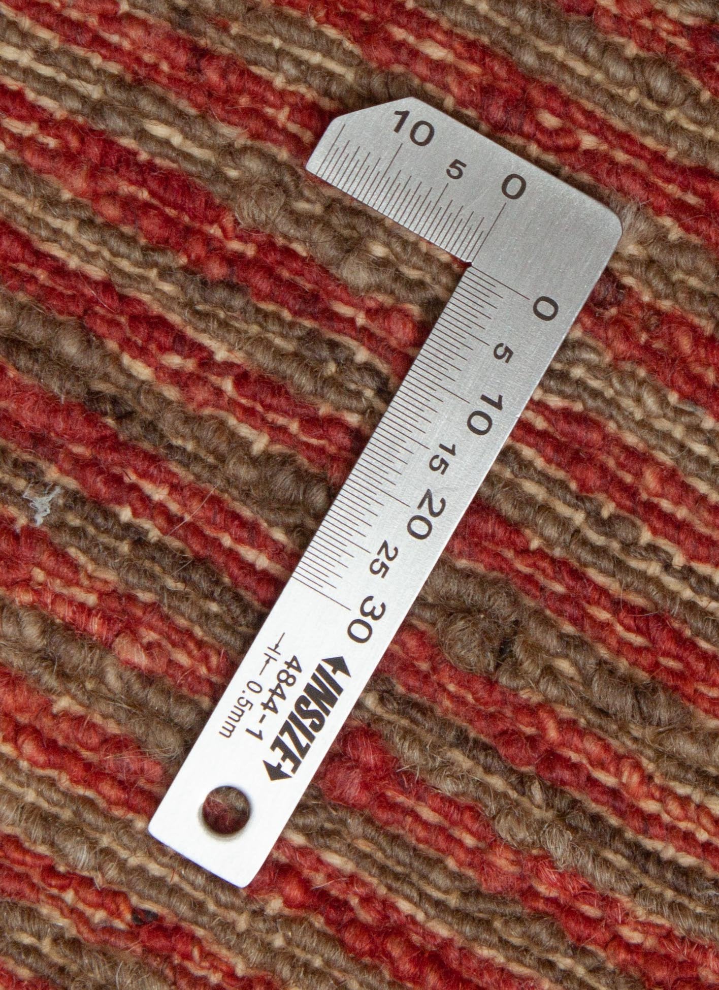 Eine Fotoaufnahme eines Lori Teppichs.