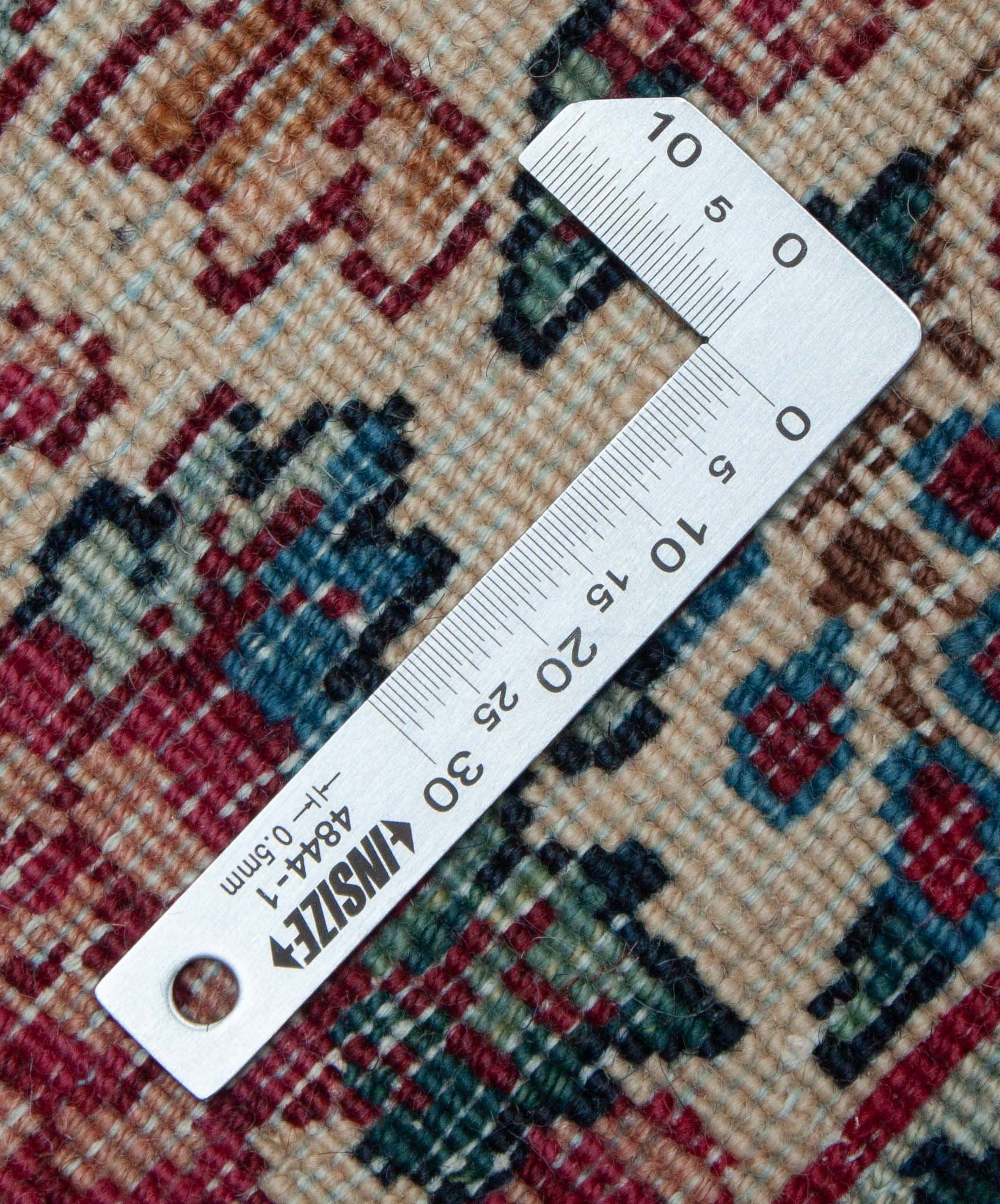 Eine Fotoaufnahme eines Kerman Teppichs.