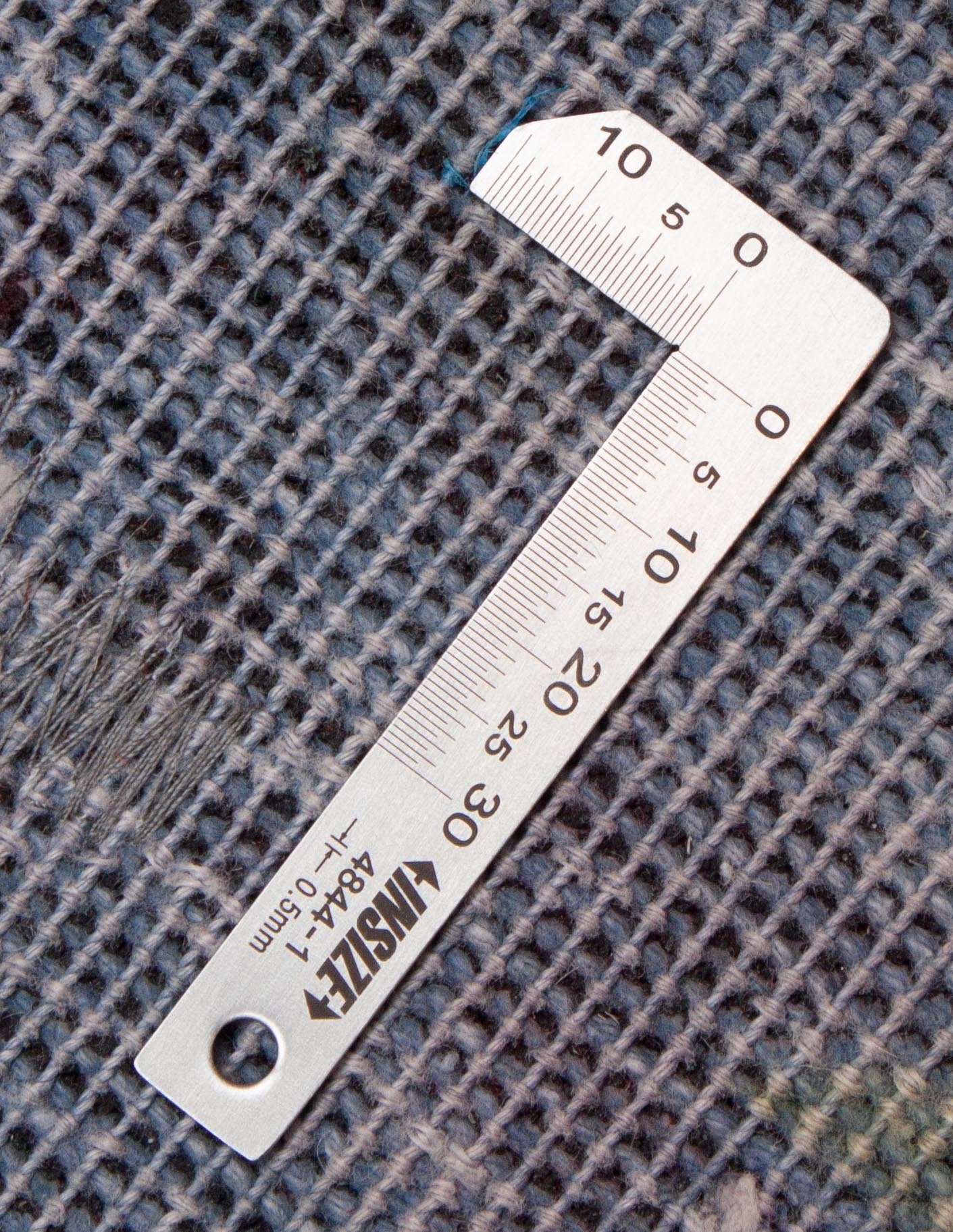 Eine Fotoaufnahme eines Vintage Teppich Teppichs.