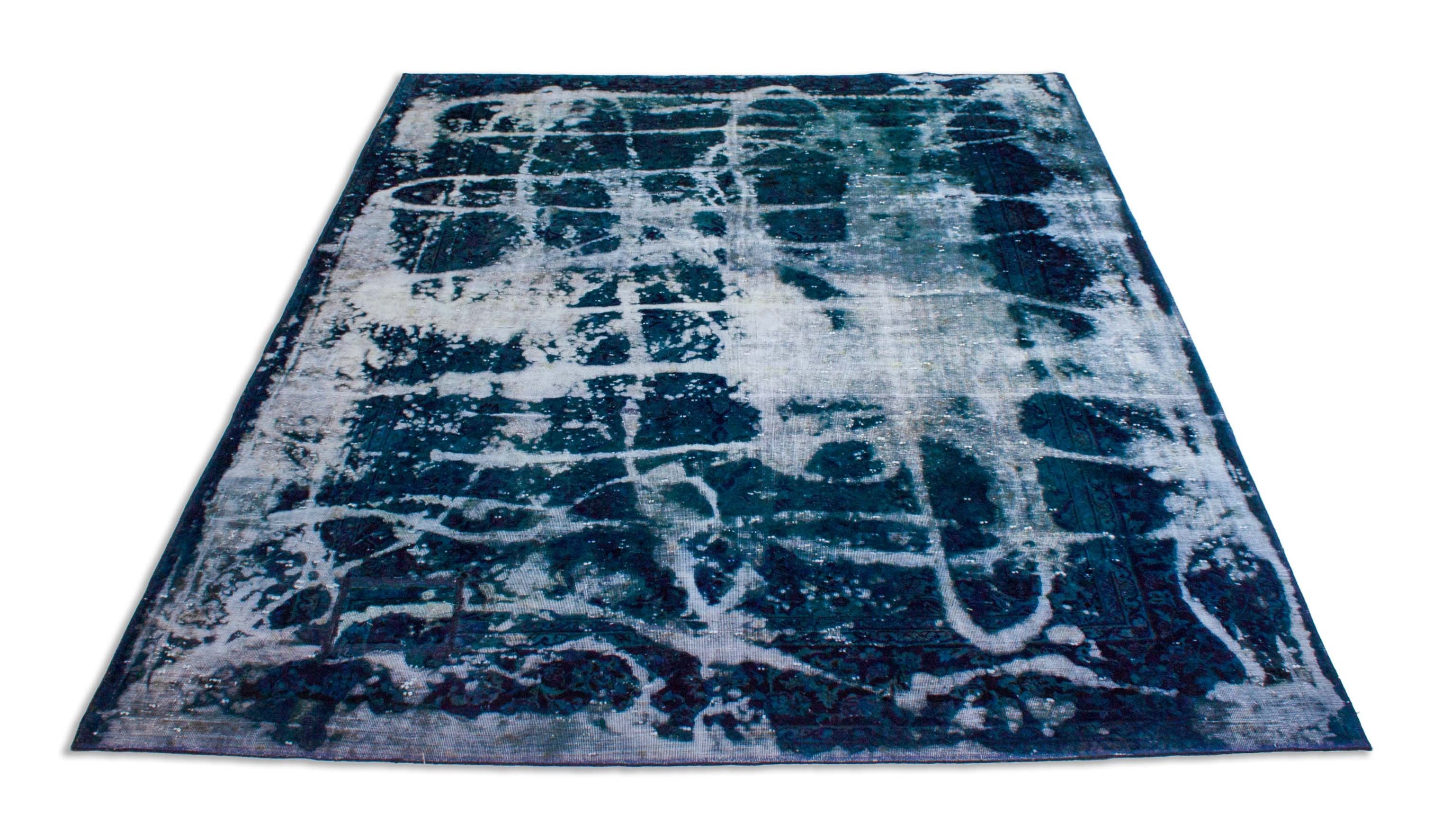 Eine Fotoaufnahme eines Vintage Teppich Teppichs.