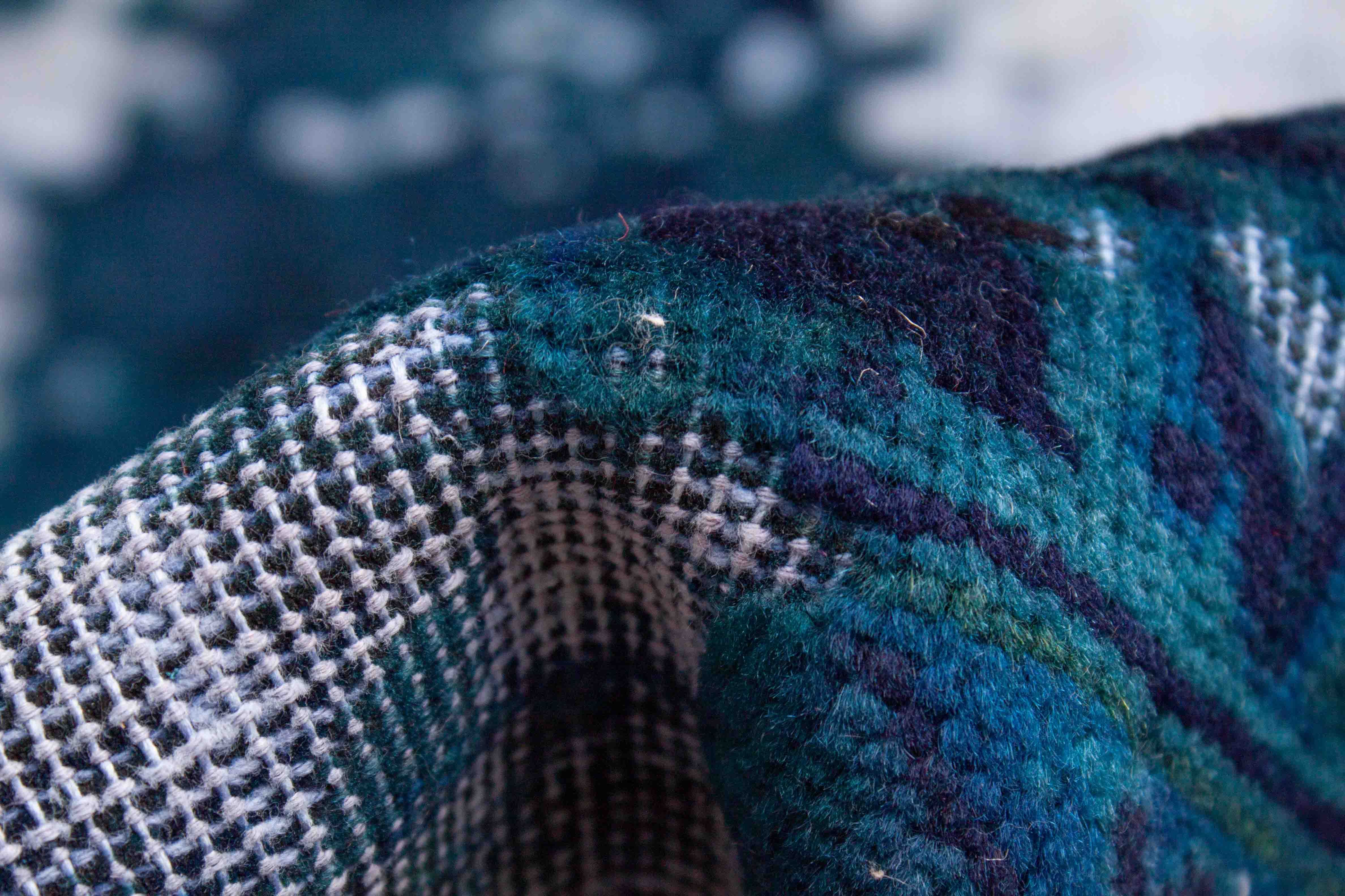 Eine Fotoaufnahme eines Vintage Teppich Teppichs.