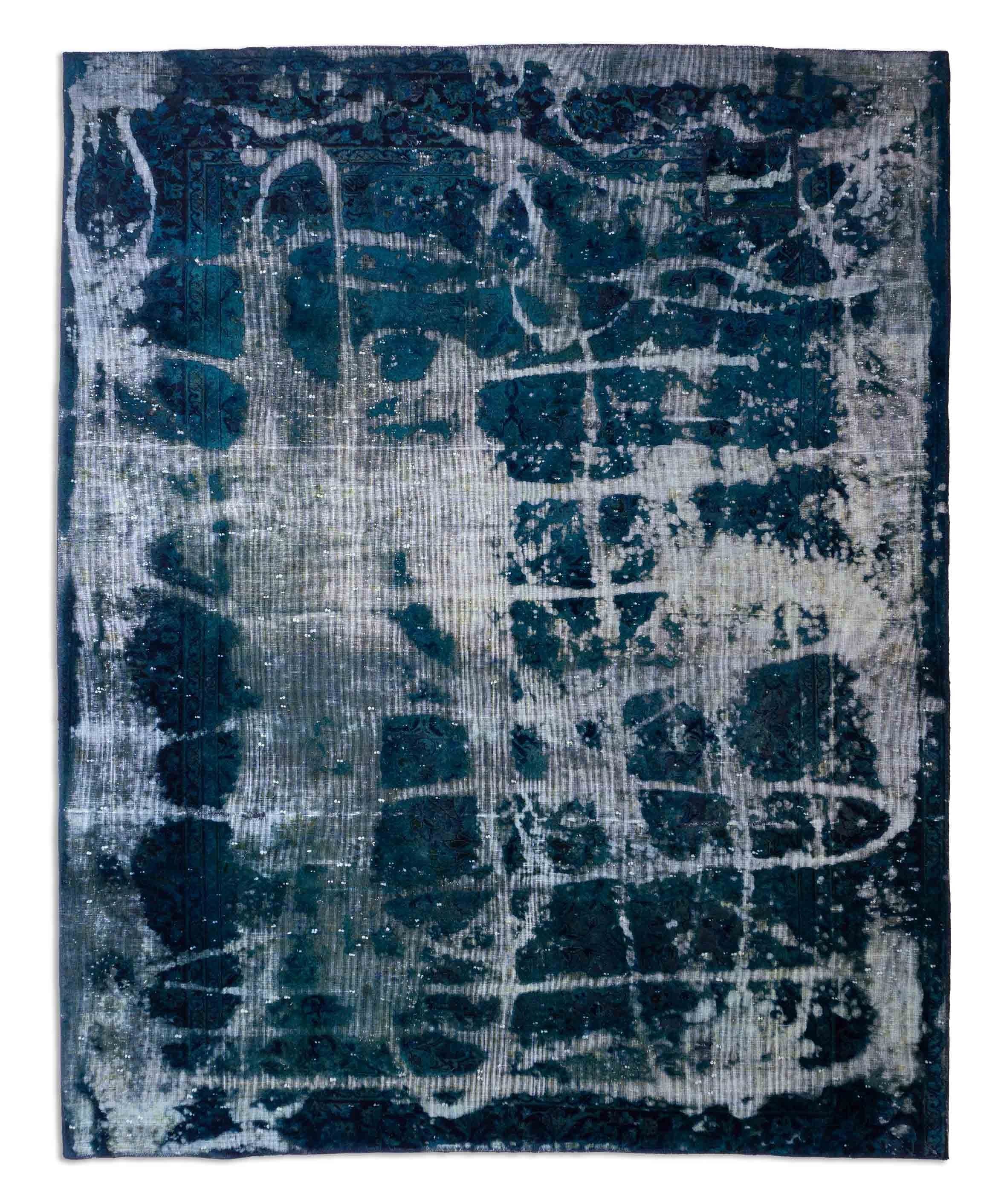 Eine Fotoaufnahme eines Vintage Teppich Teppichs.