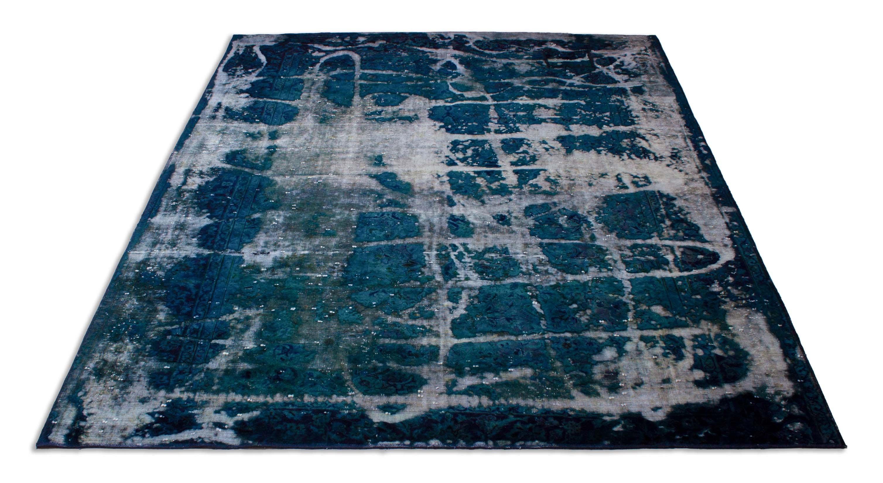 Eine Fotoaufnahme eines Vintage Teppich Teppichs.