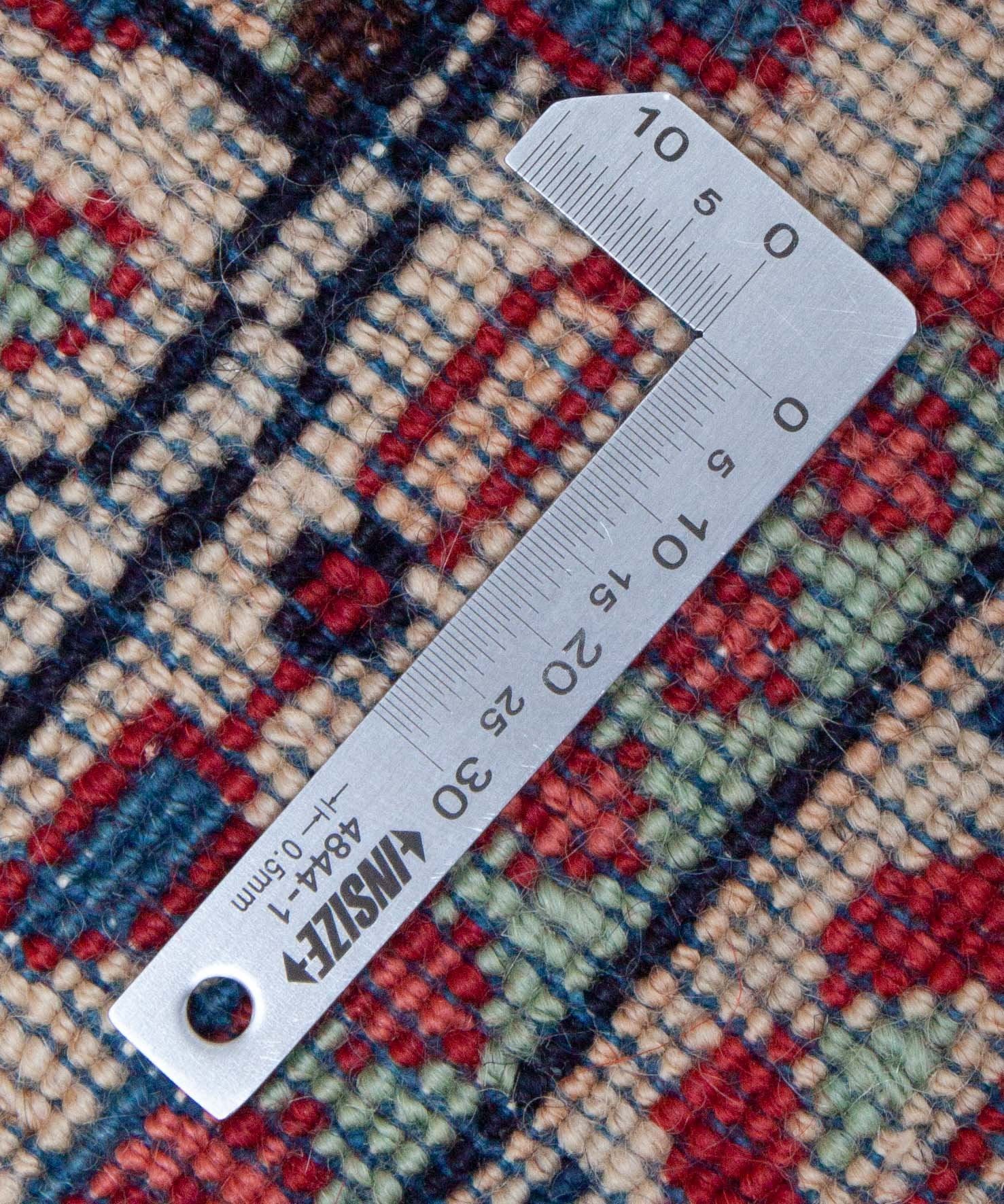 Eine Fotoaufnahme eines Sarough Teppichs.